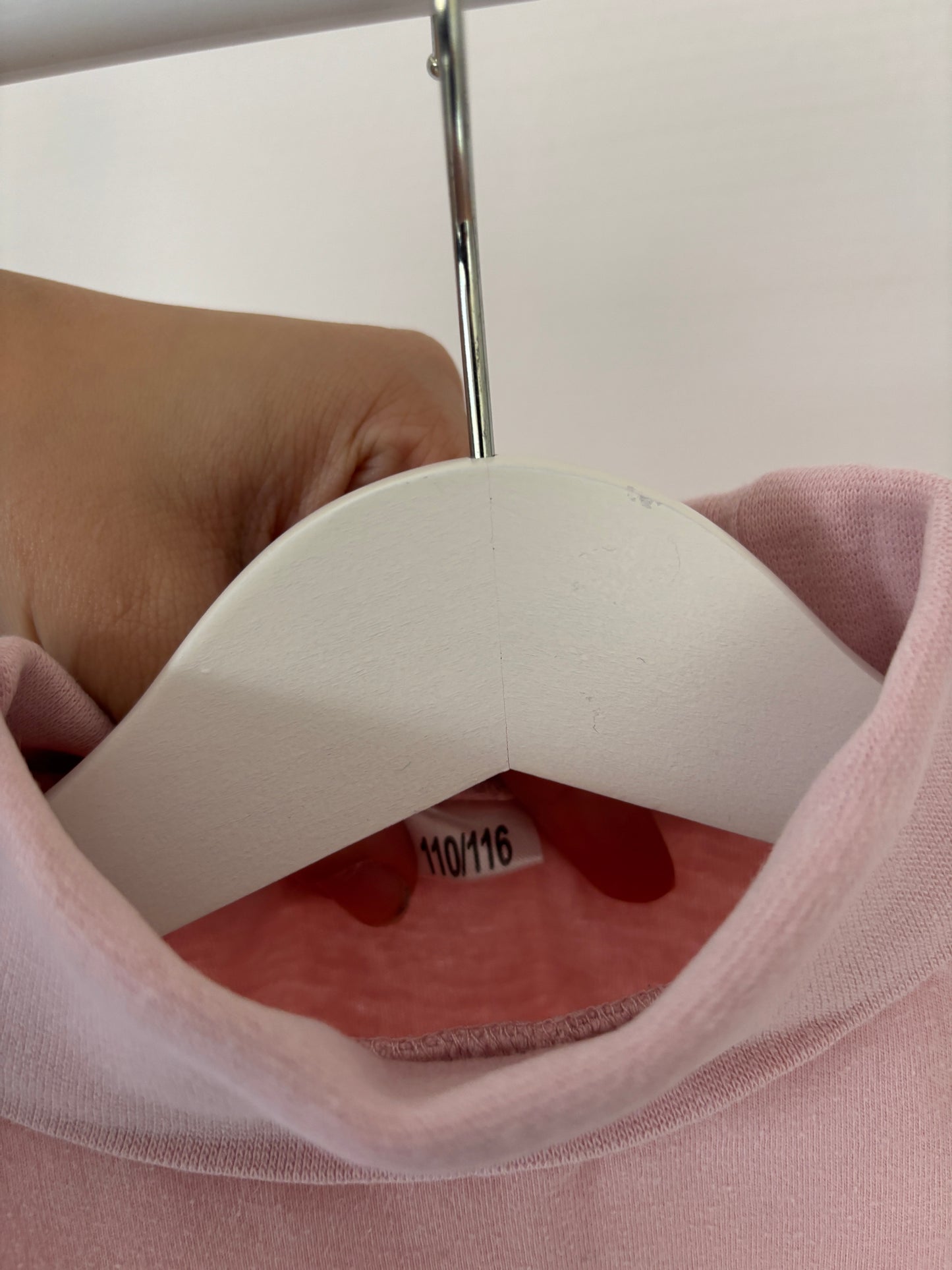 Lichtroze longsleeve met rolkraag