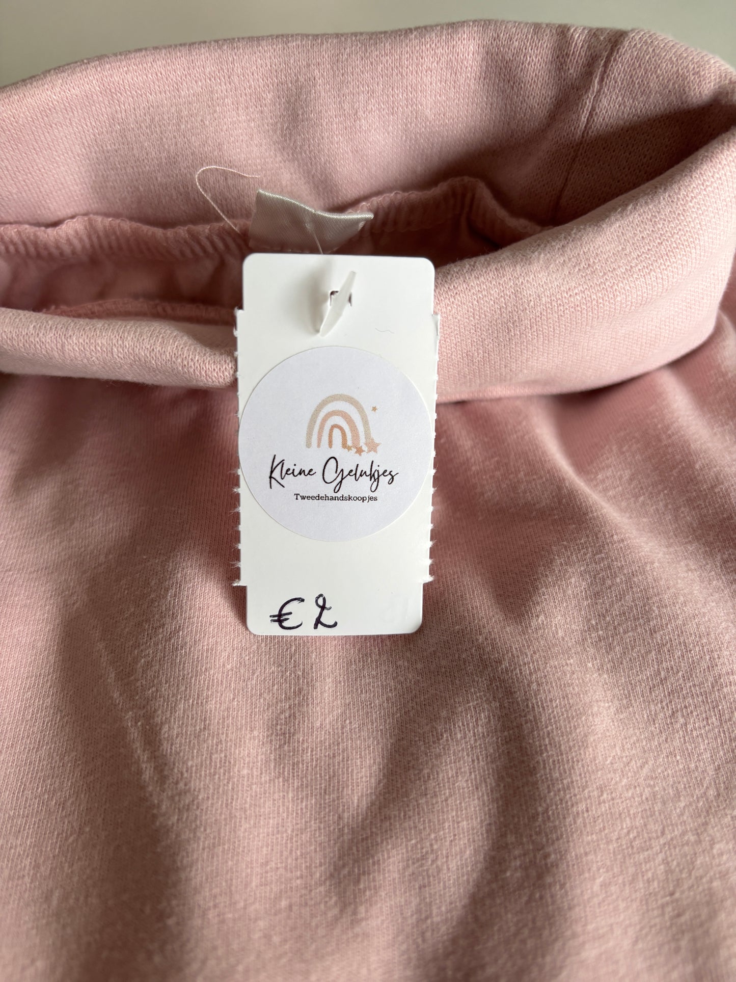 Lichtroze longsleeve met rolkraag