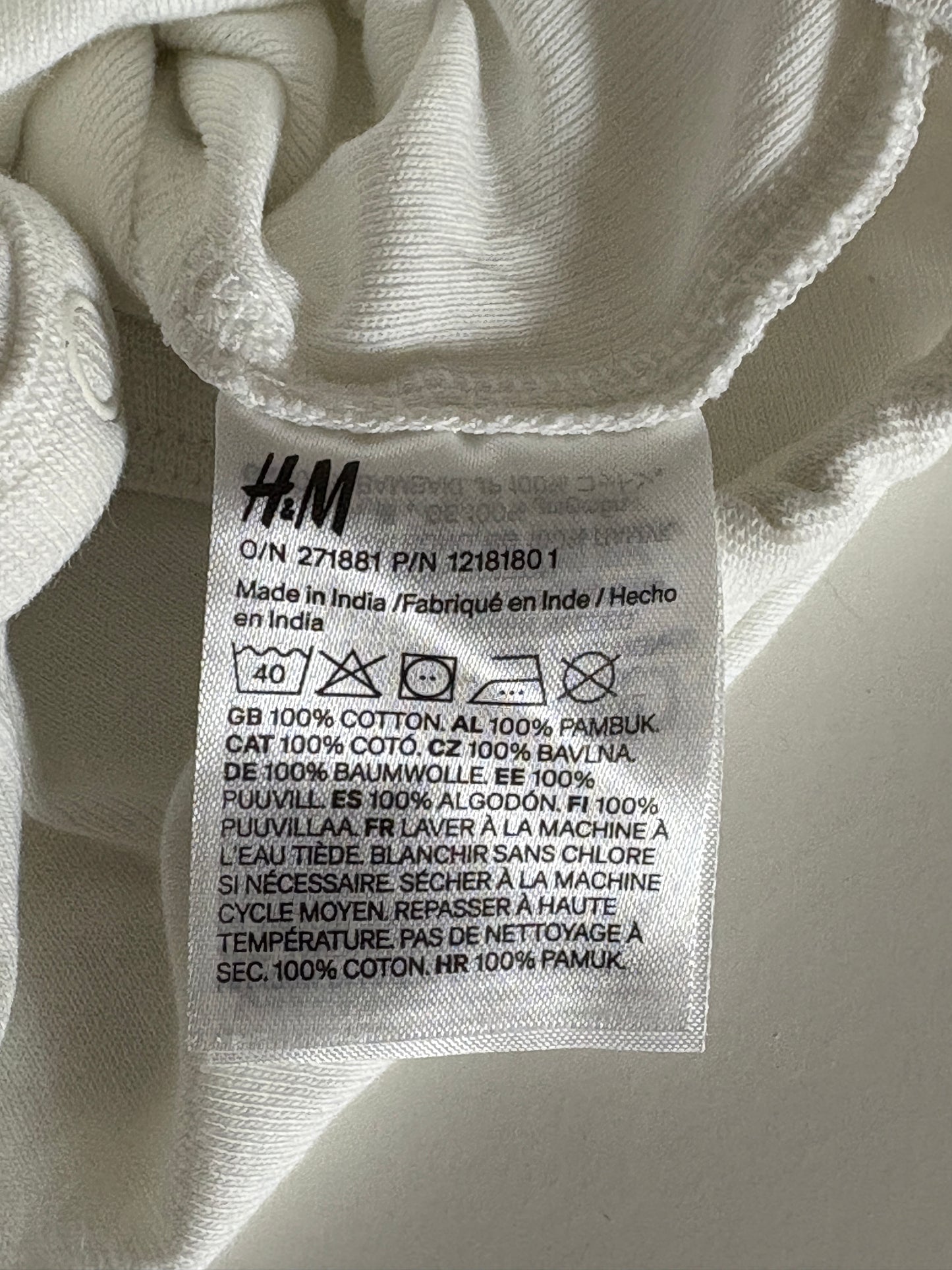 Setje: witte romper met korte mouwen en blauwgrijze salopette