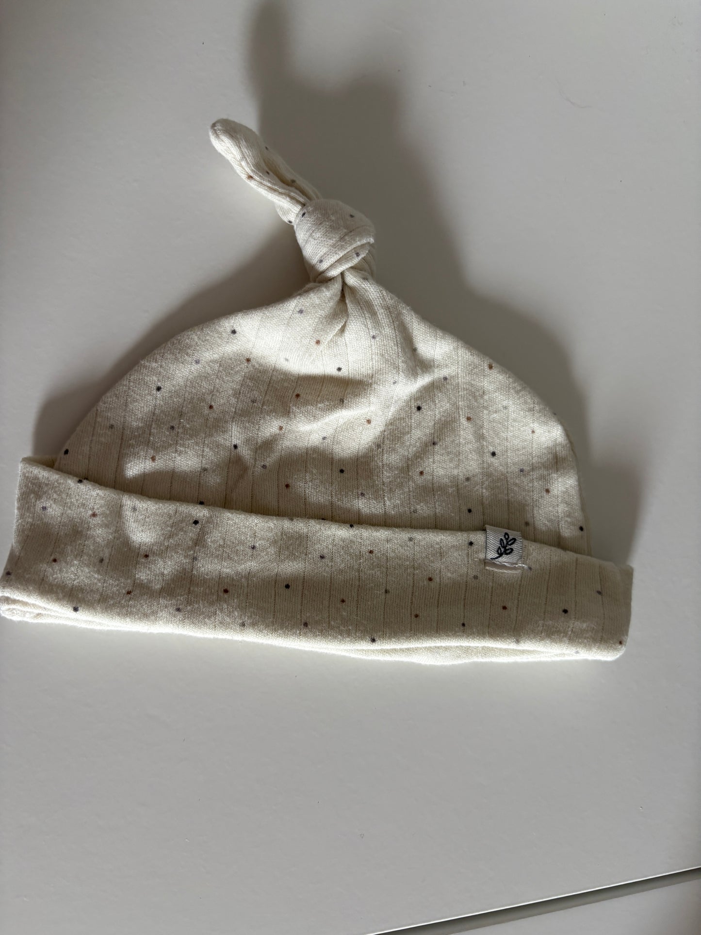 Gestippeld boxpakje en bijpassend mutsje