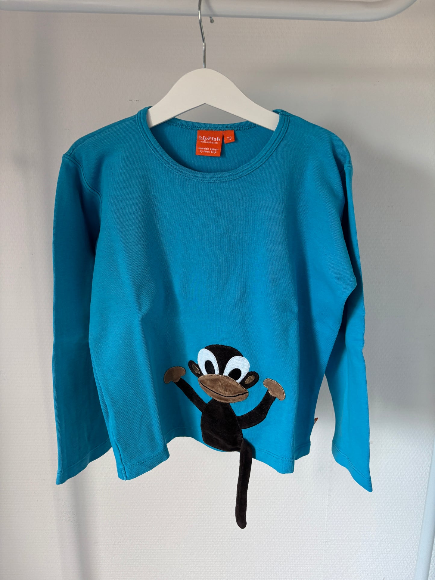 Blauwe longsleeve met aap