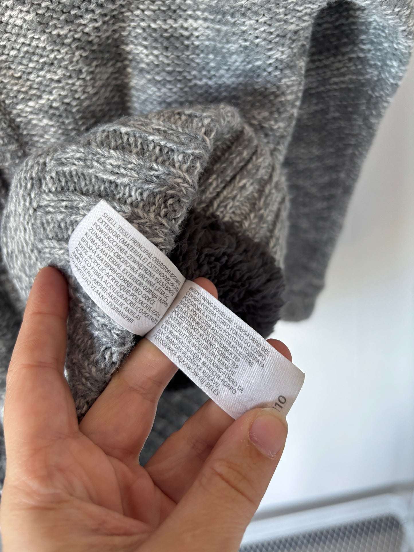 Grijze gevoerde vest