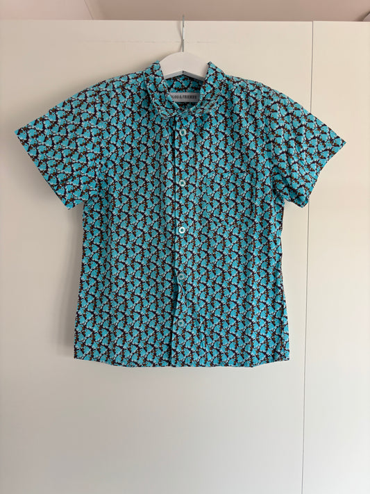 Lichtblauw hemd met korte mouwen