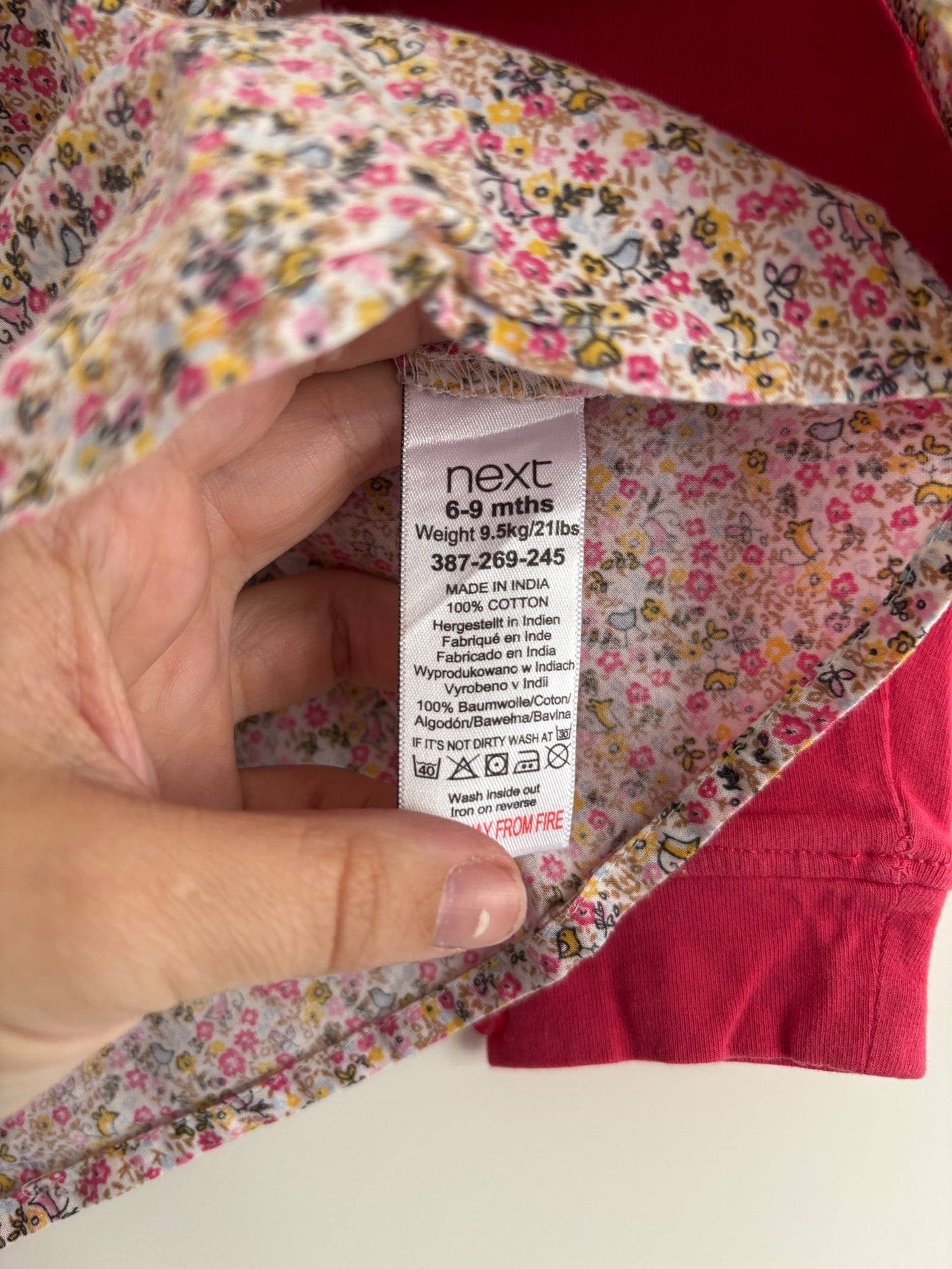 Setje: bloemenblouse en roze legging