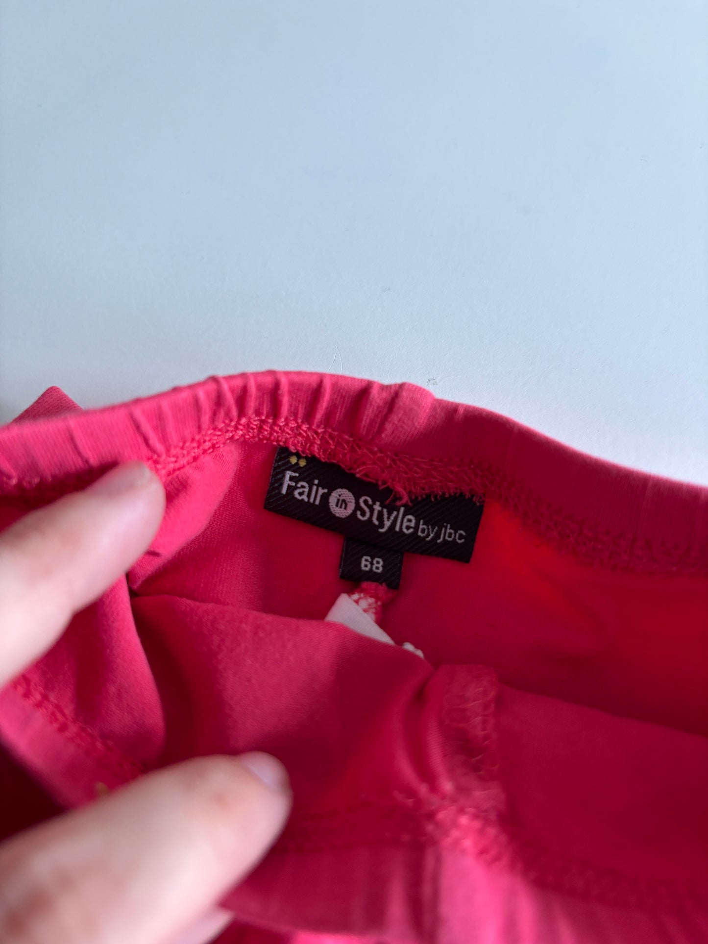 Setje: bloemenblouse en roze legging