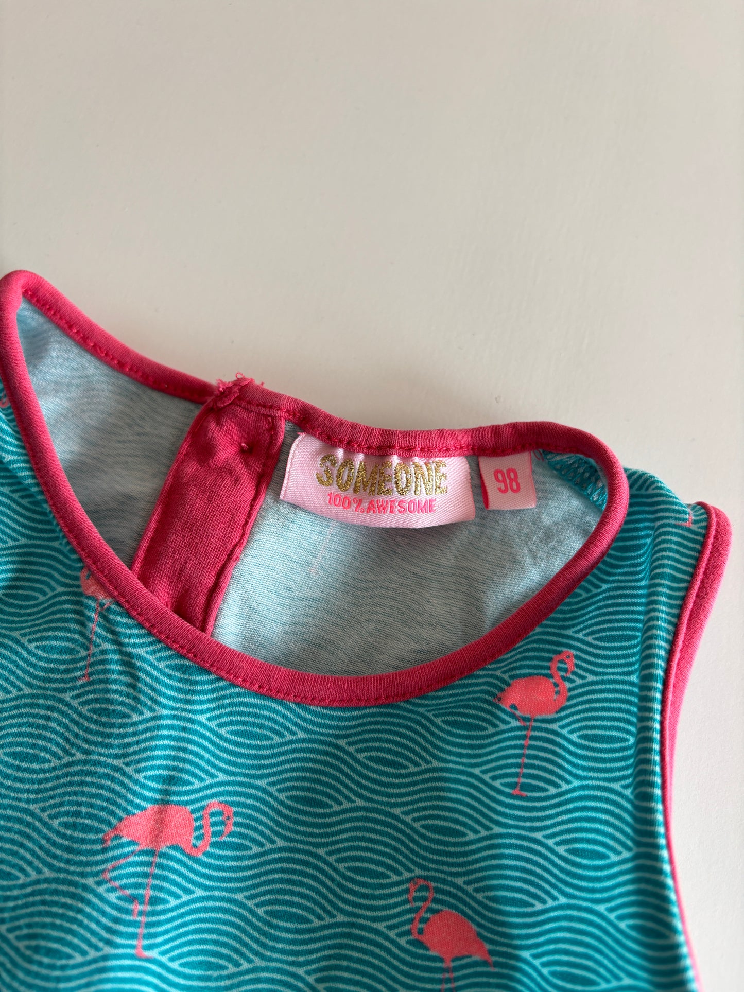 Lichtblauwe playsuit met flamingo's