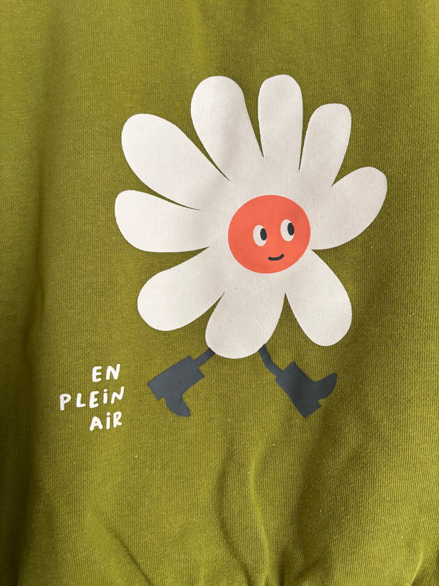 Mosterdgroene sweater met bloem