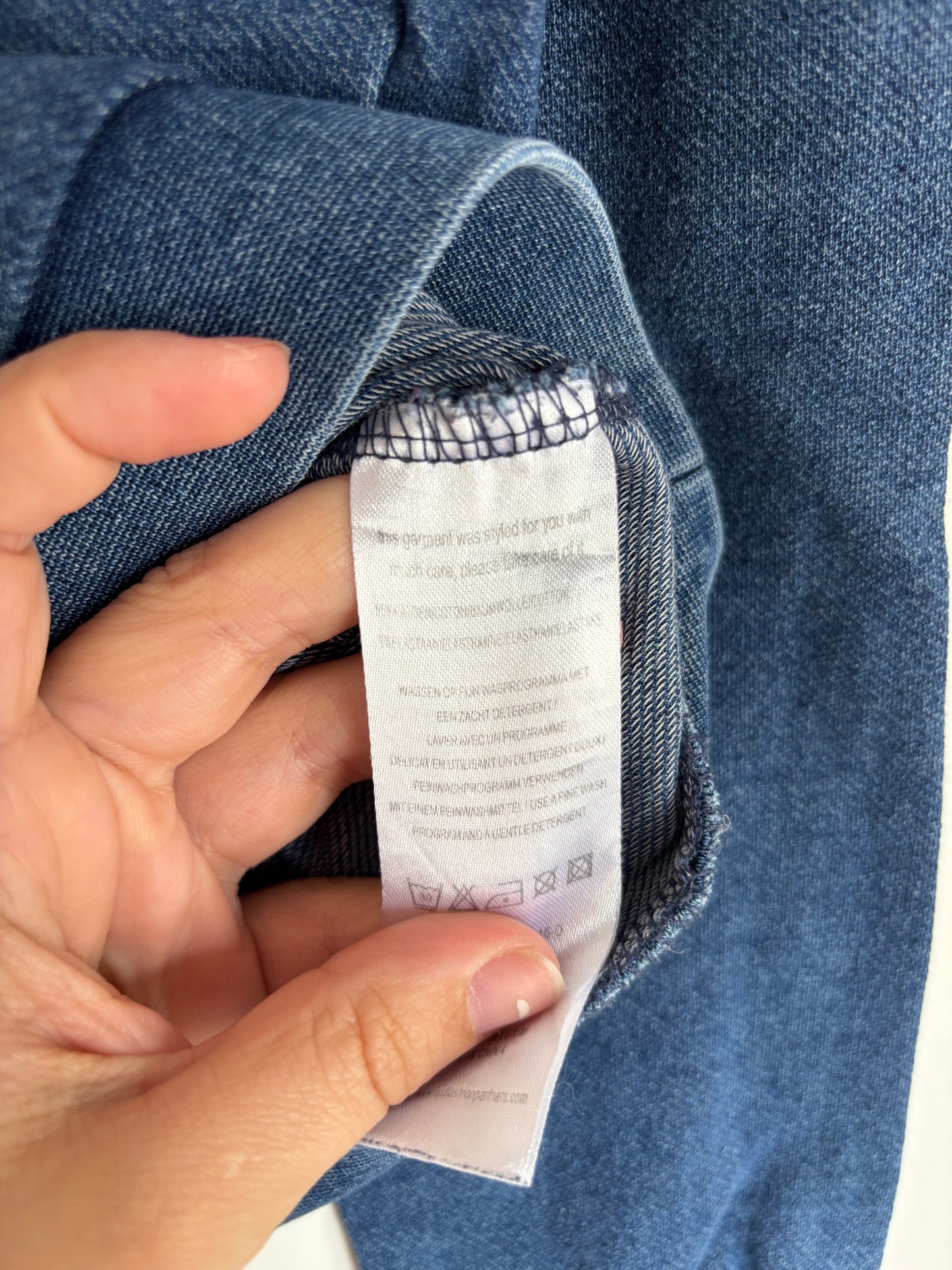 Blauwe sweater met jeanslook