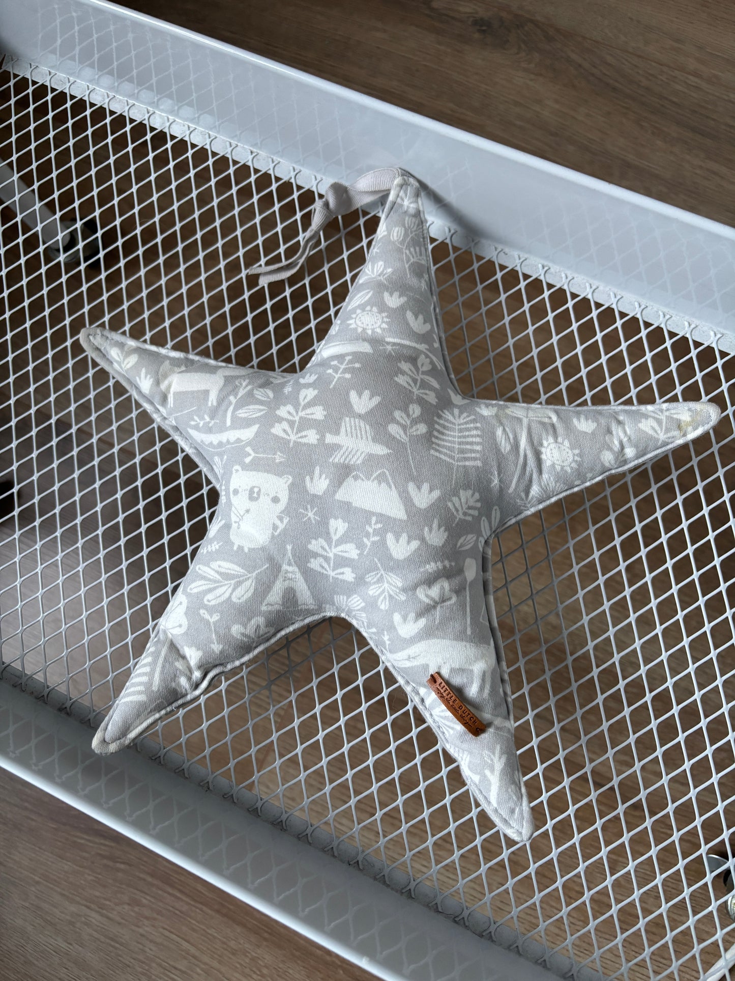 Grijze ster met belletje