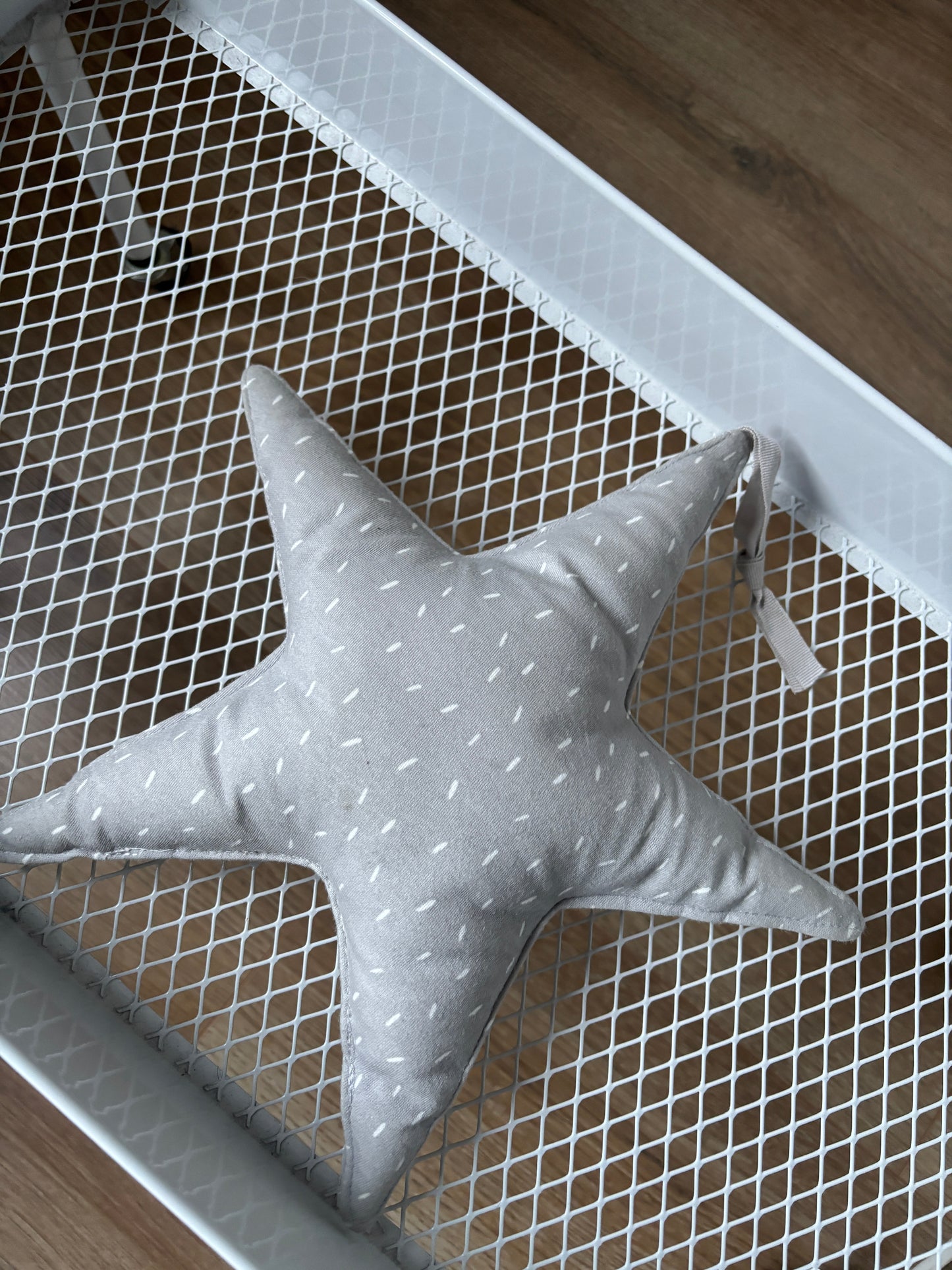 Grijze ster met belletje