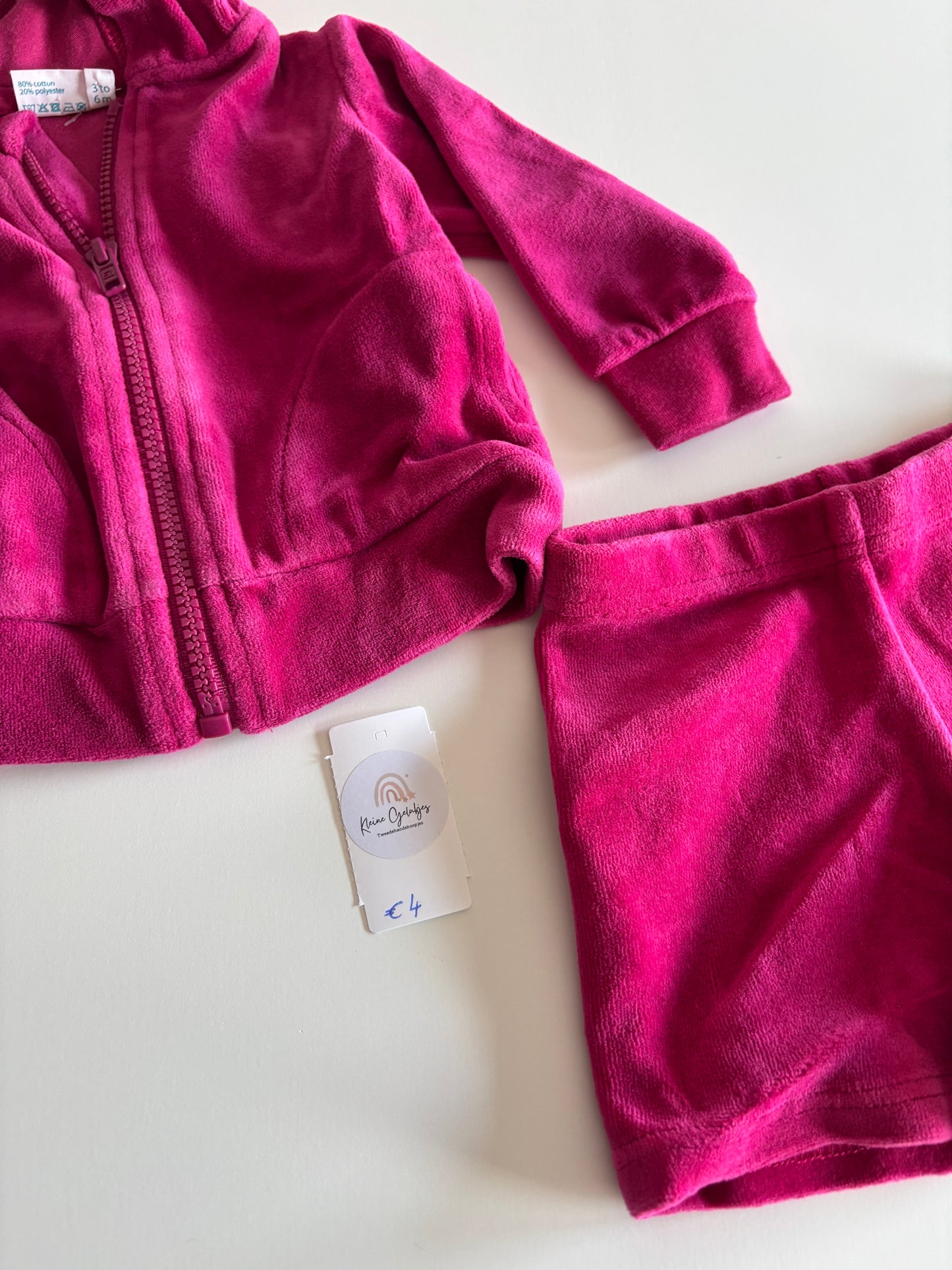 Roze setje: vest en broekje