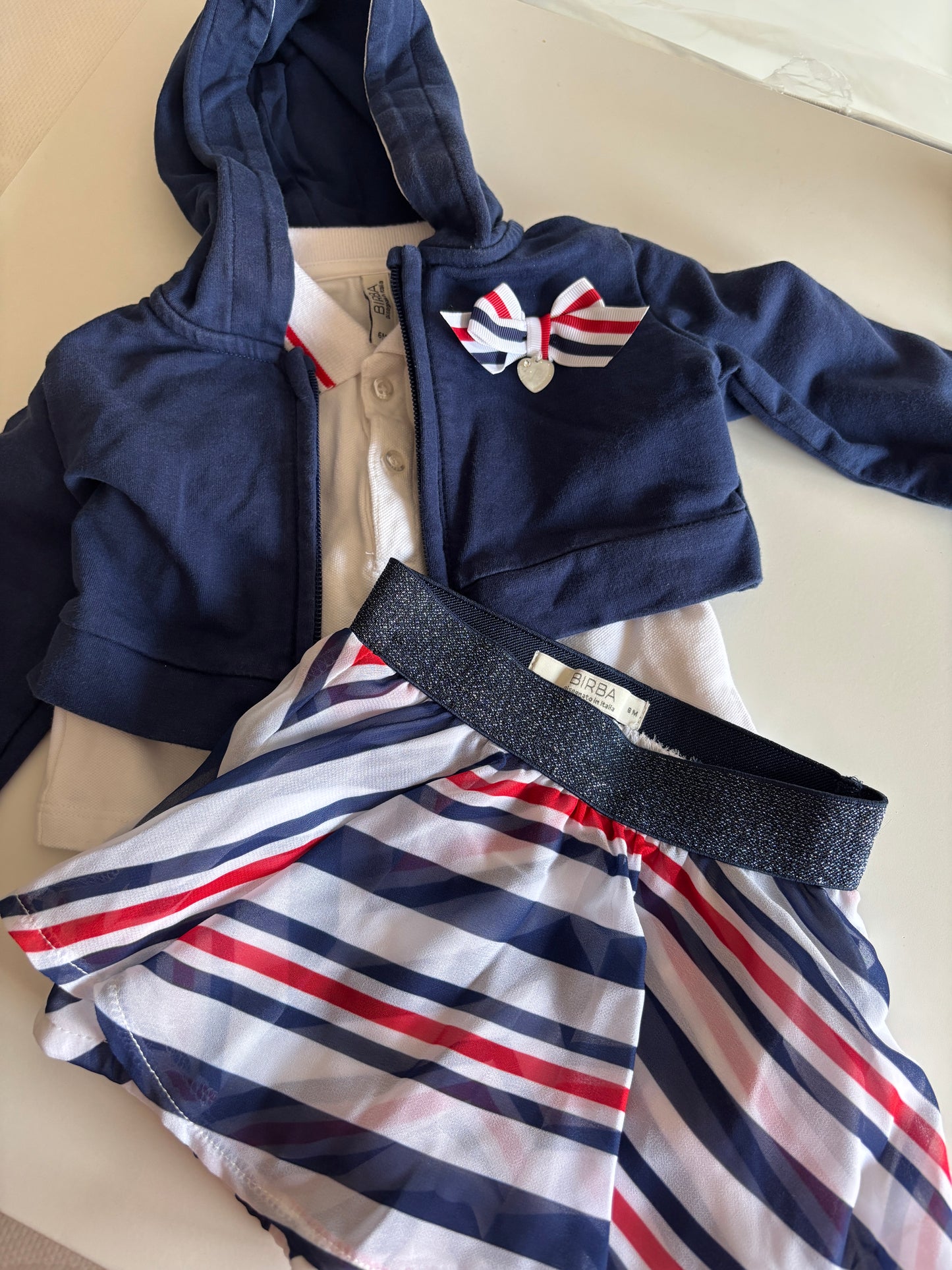 Setje: vest, polo en rokje