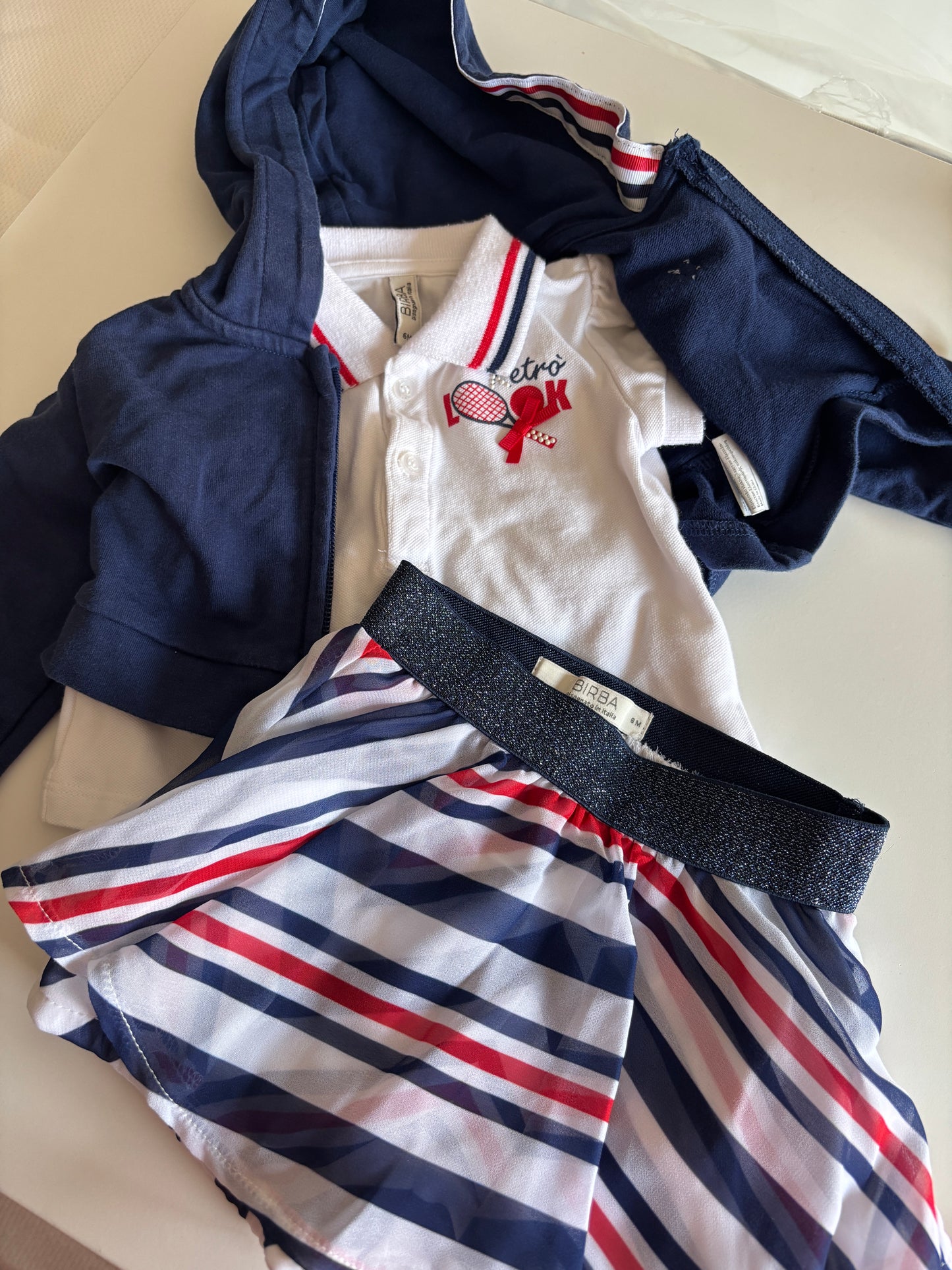 Setje: vest, polo en rokje