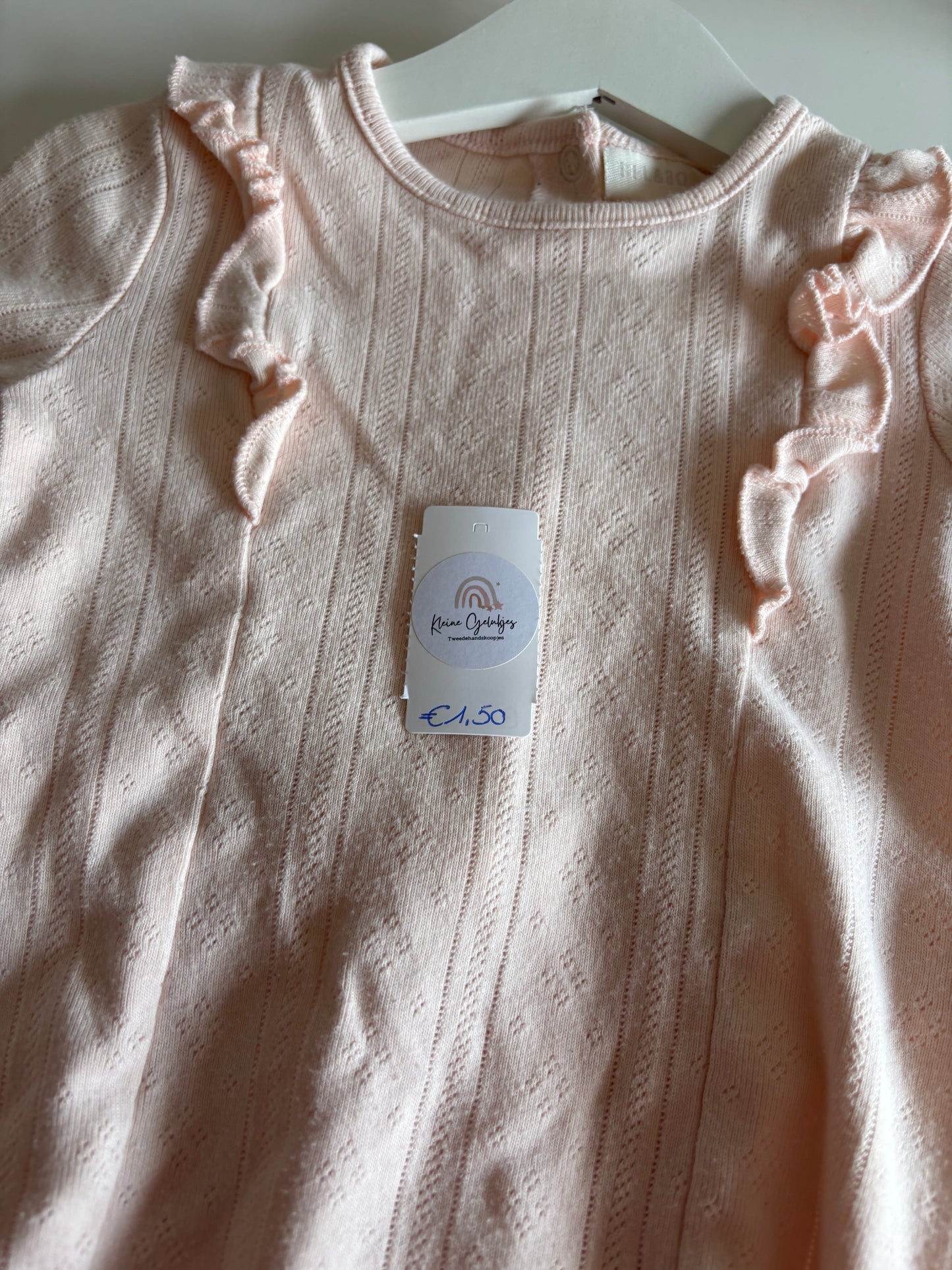 Lichtroze eendelige pyjama