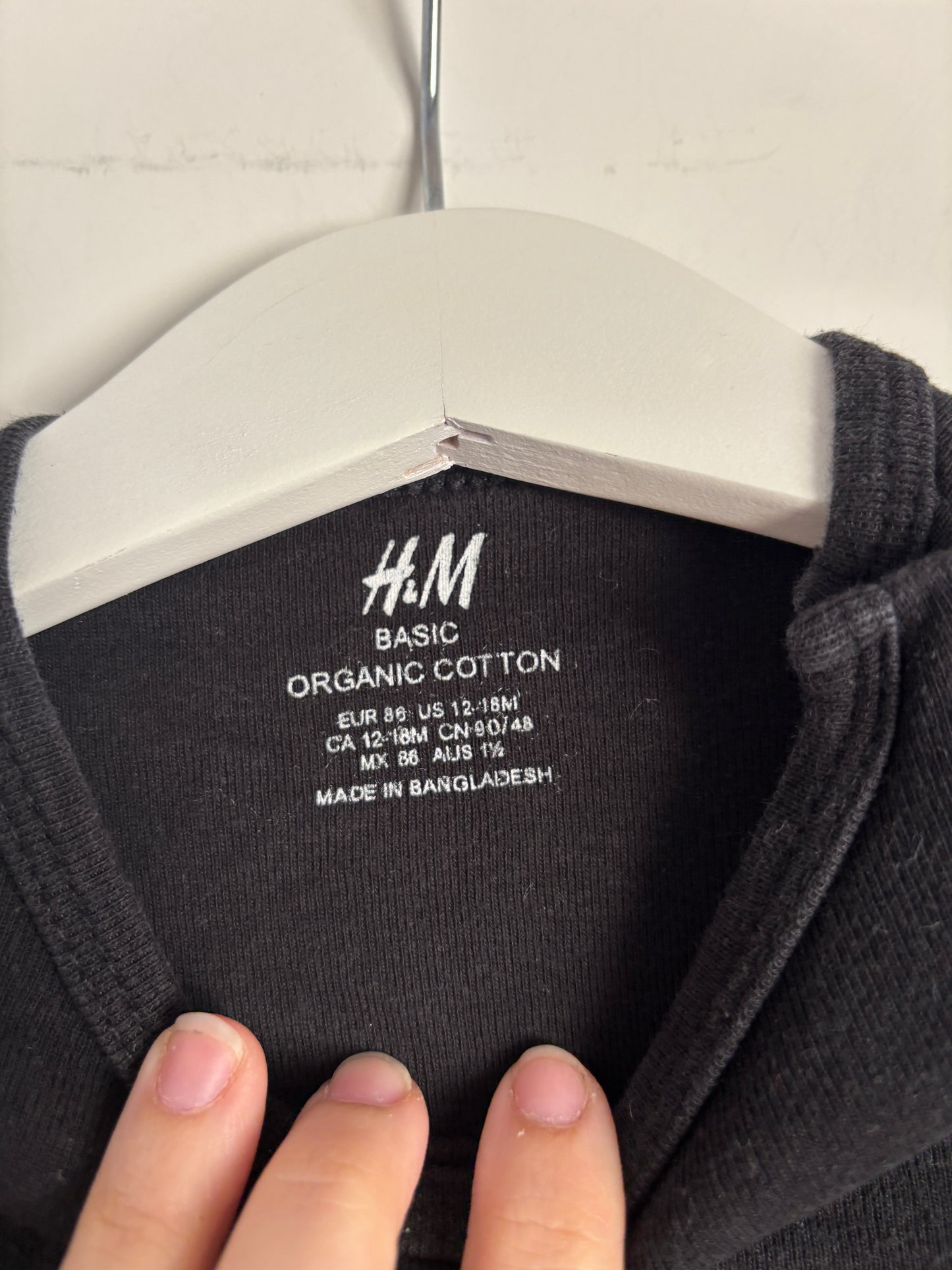 Zwarte romper met lange mouwen