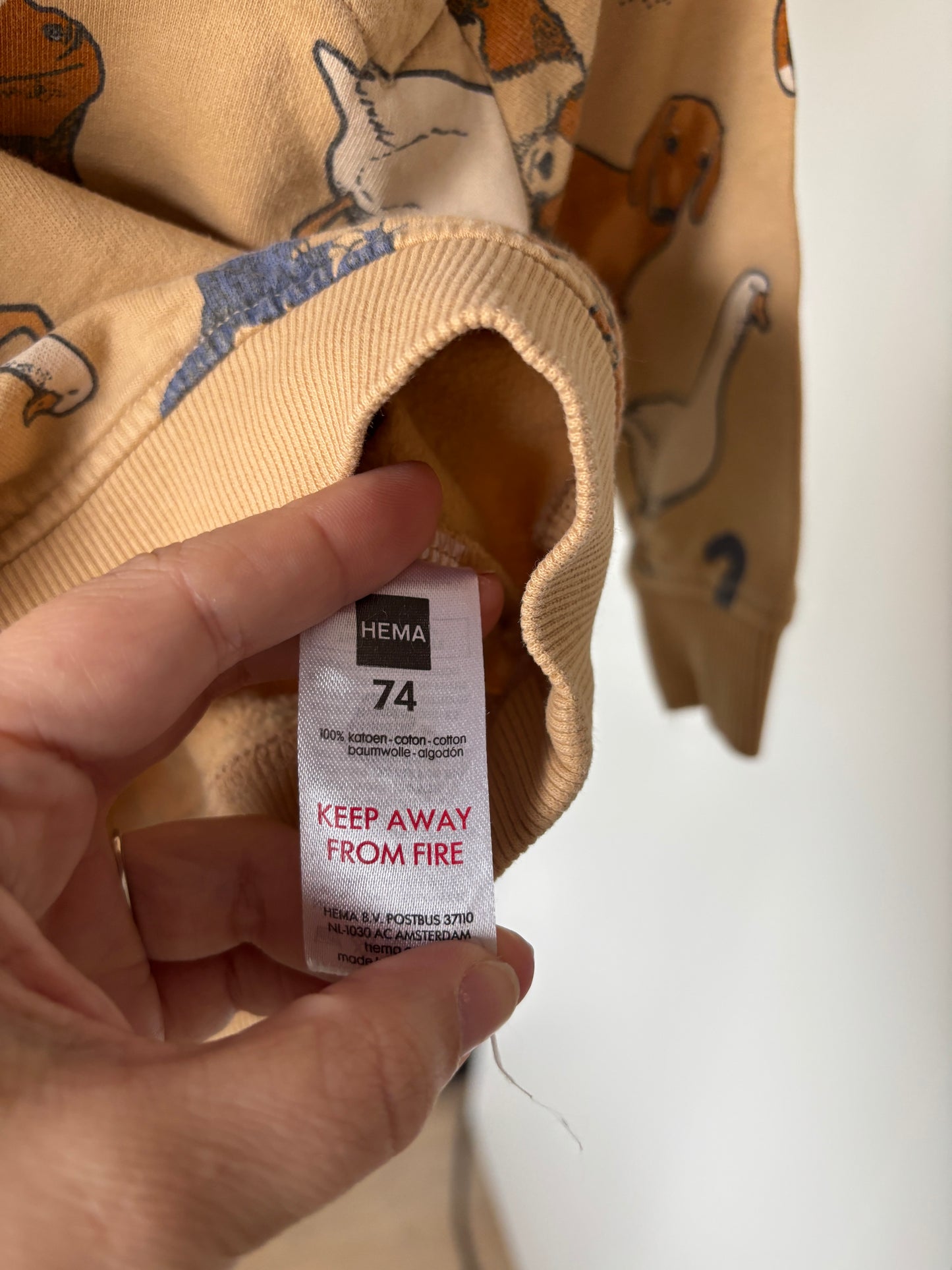 Beige sweater met diertjes