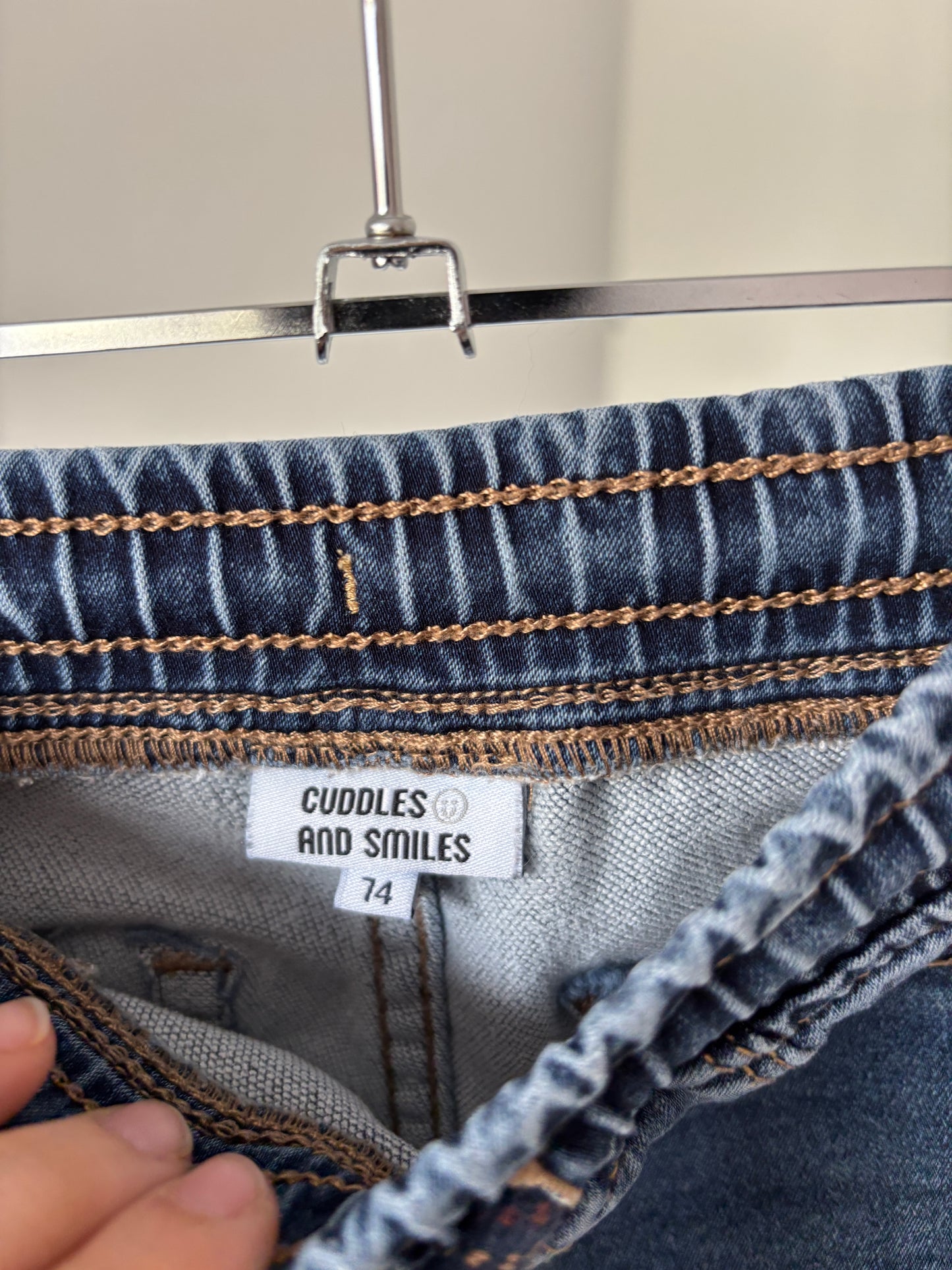 Setje: marineblauwe gestreepte longslevee en jeansbroek