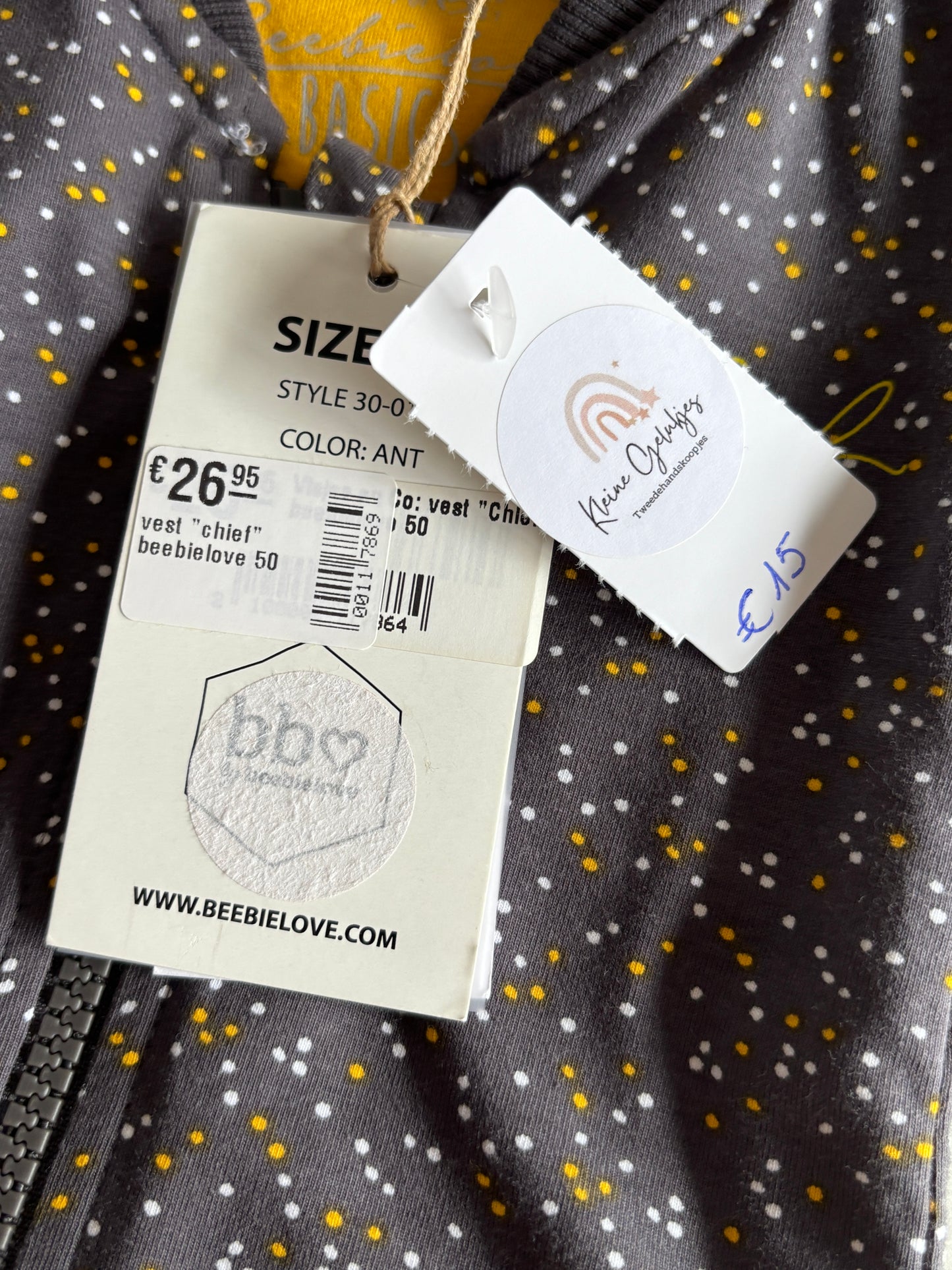 Grijze gestippelde vest