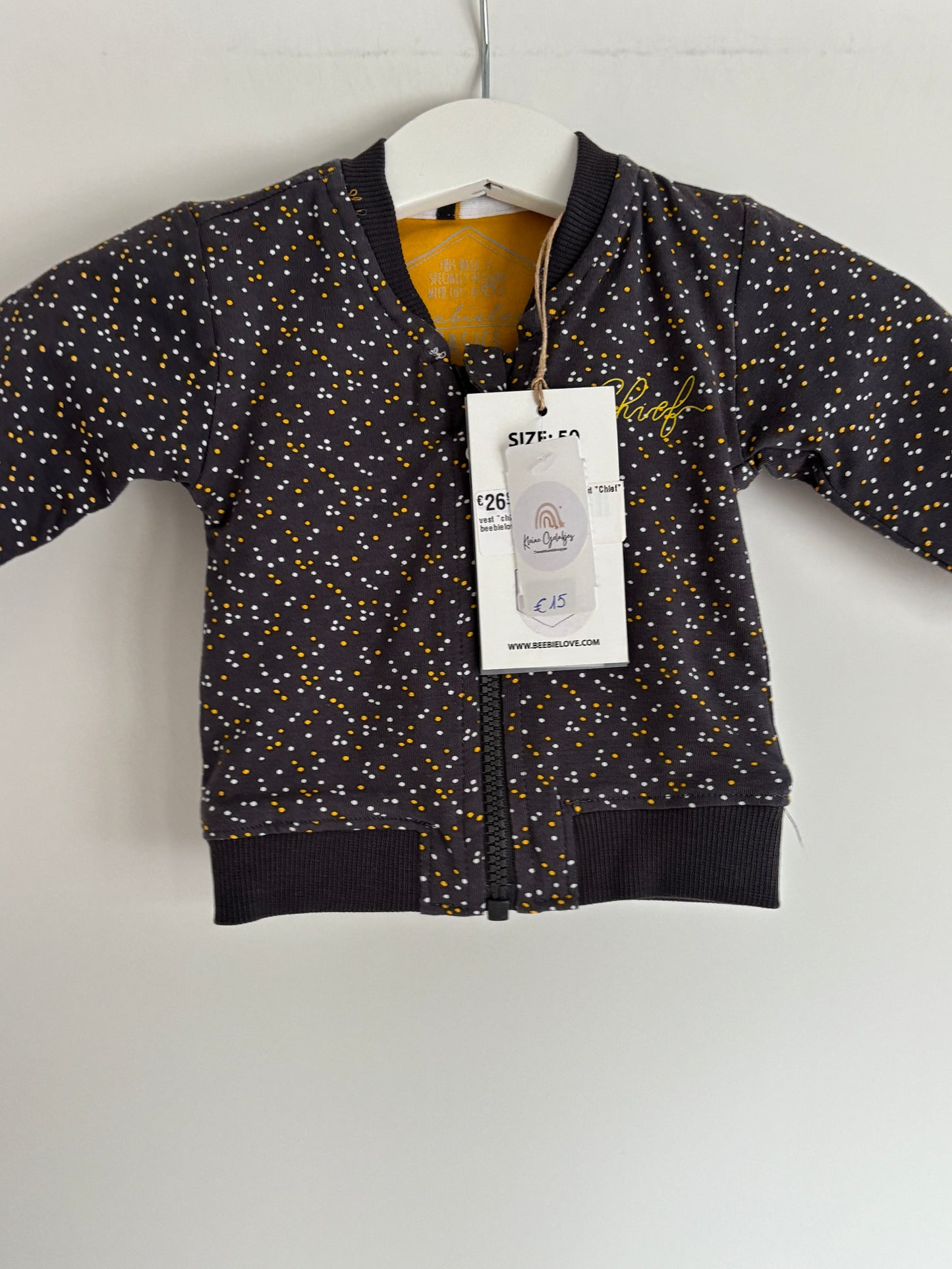 Grijze gestippelde vest