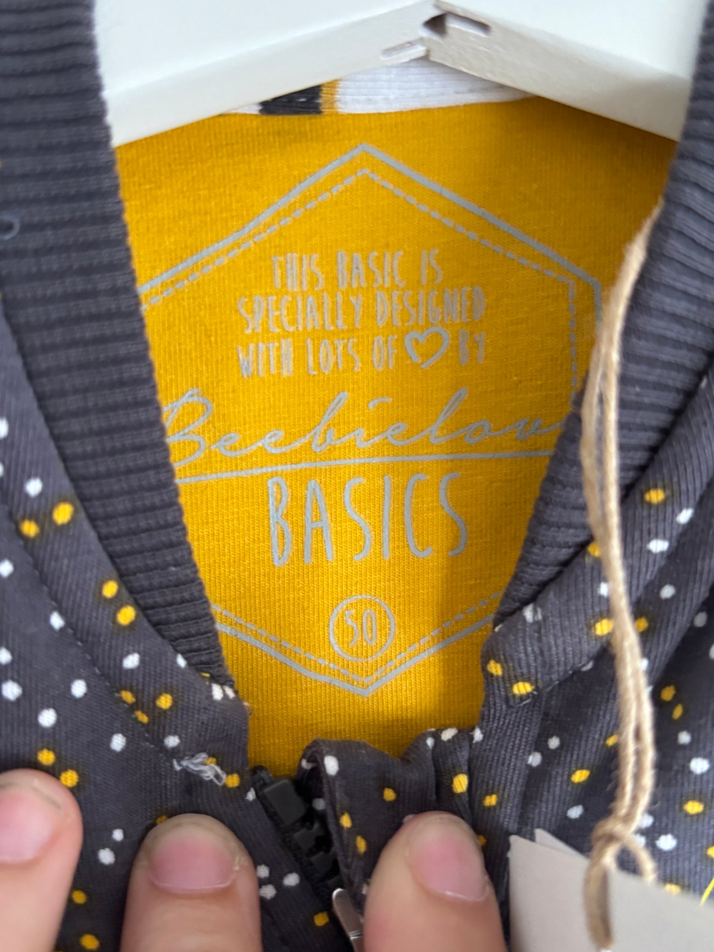 Grijze gestippelde vest