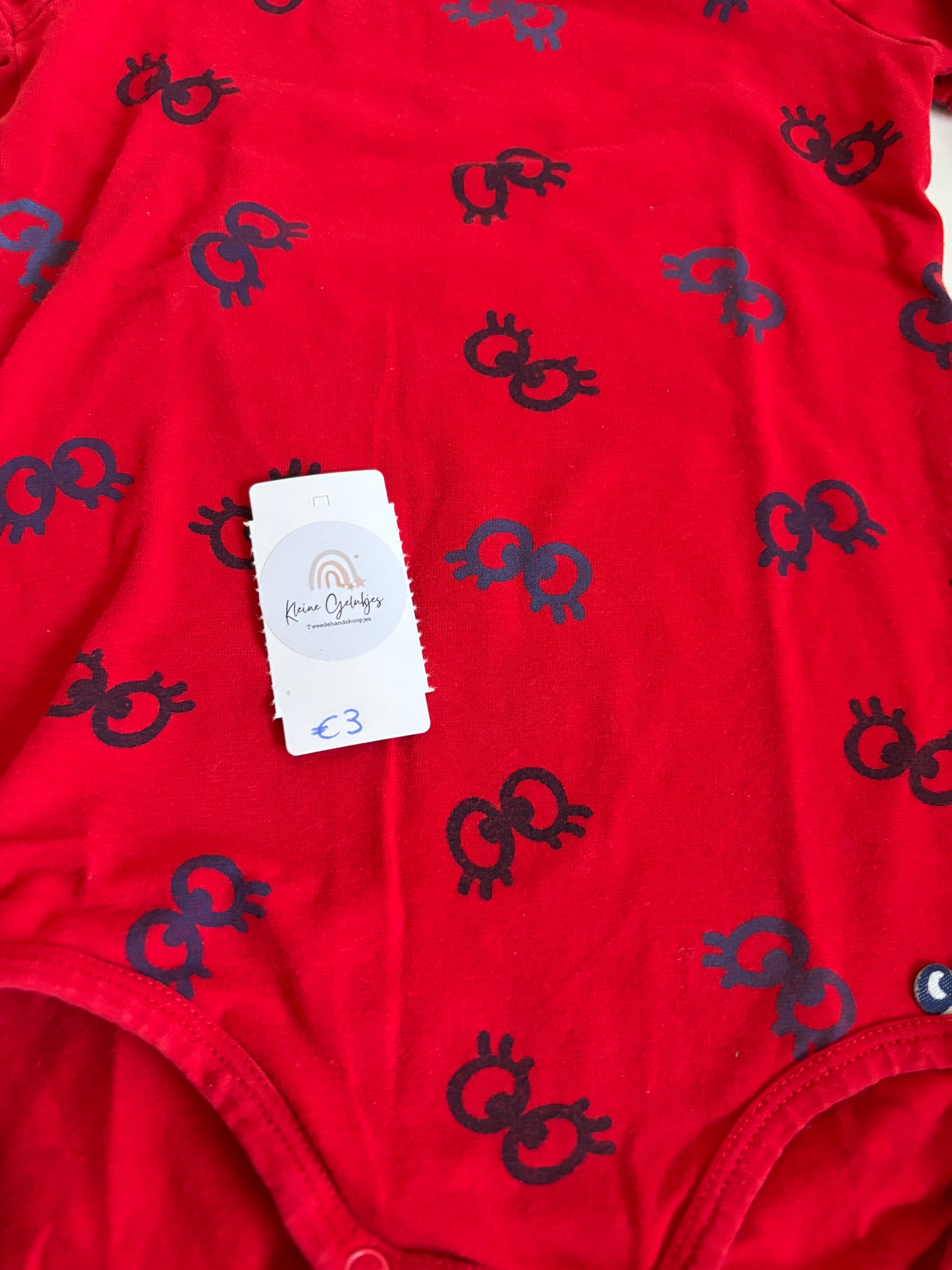 Rode romper met korte mouwen