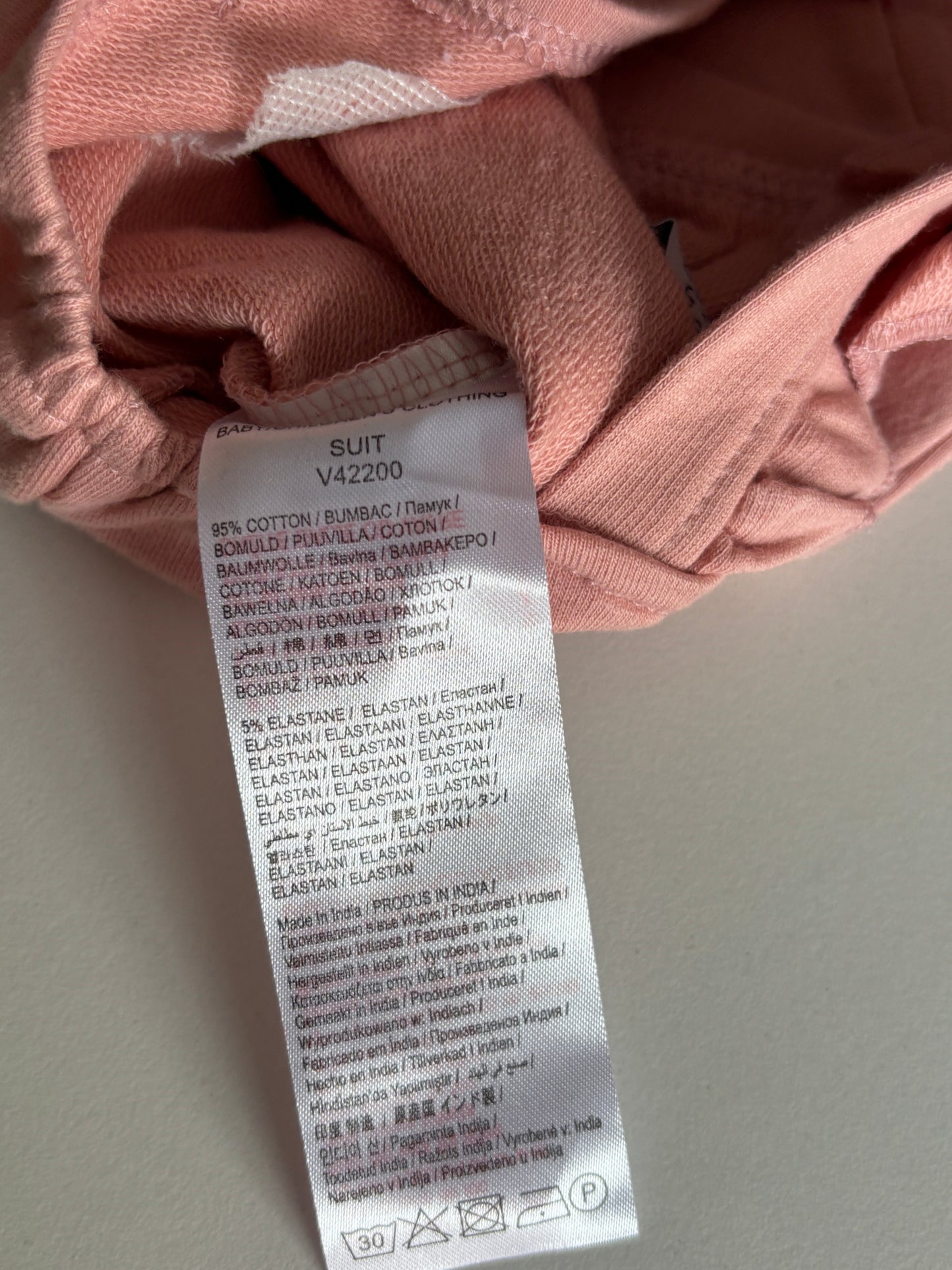 Setje: roze salopette en gestreepte t-shirt