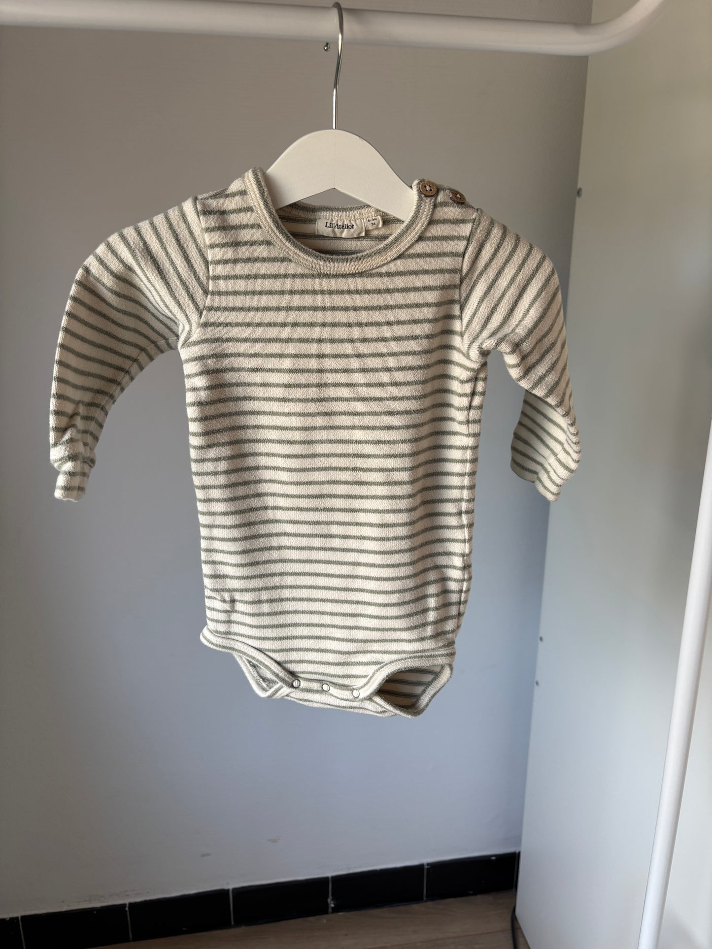 Gestreepte romper met lange mouwen