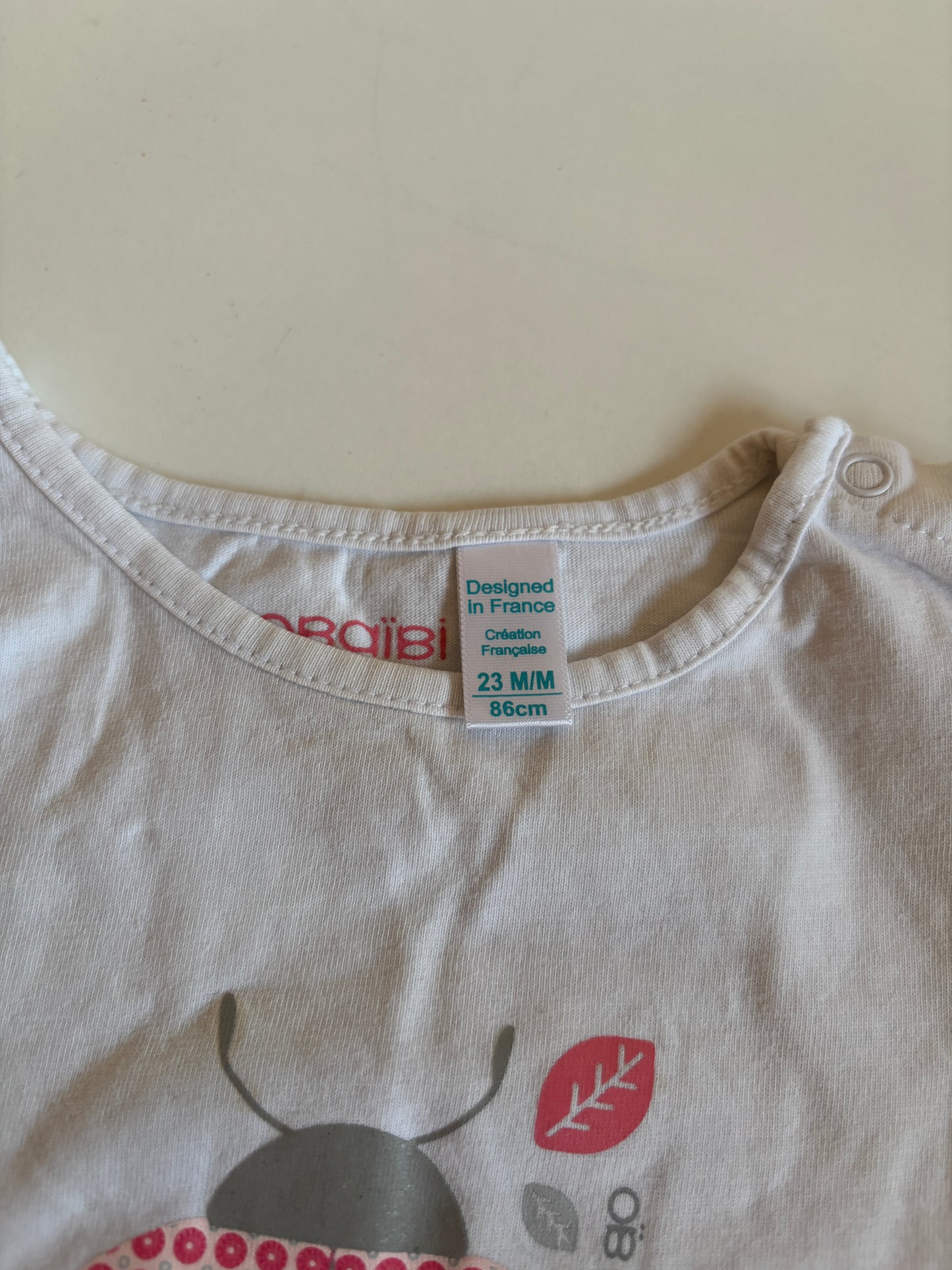 Witte T-shirt met lieveheersbeestje