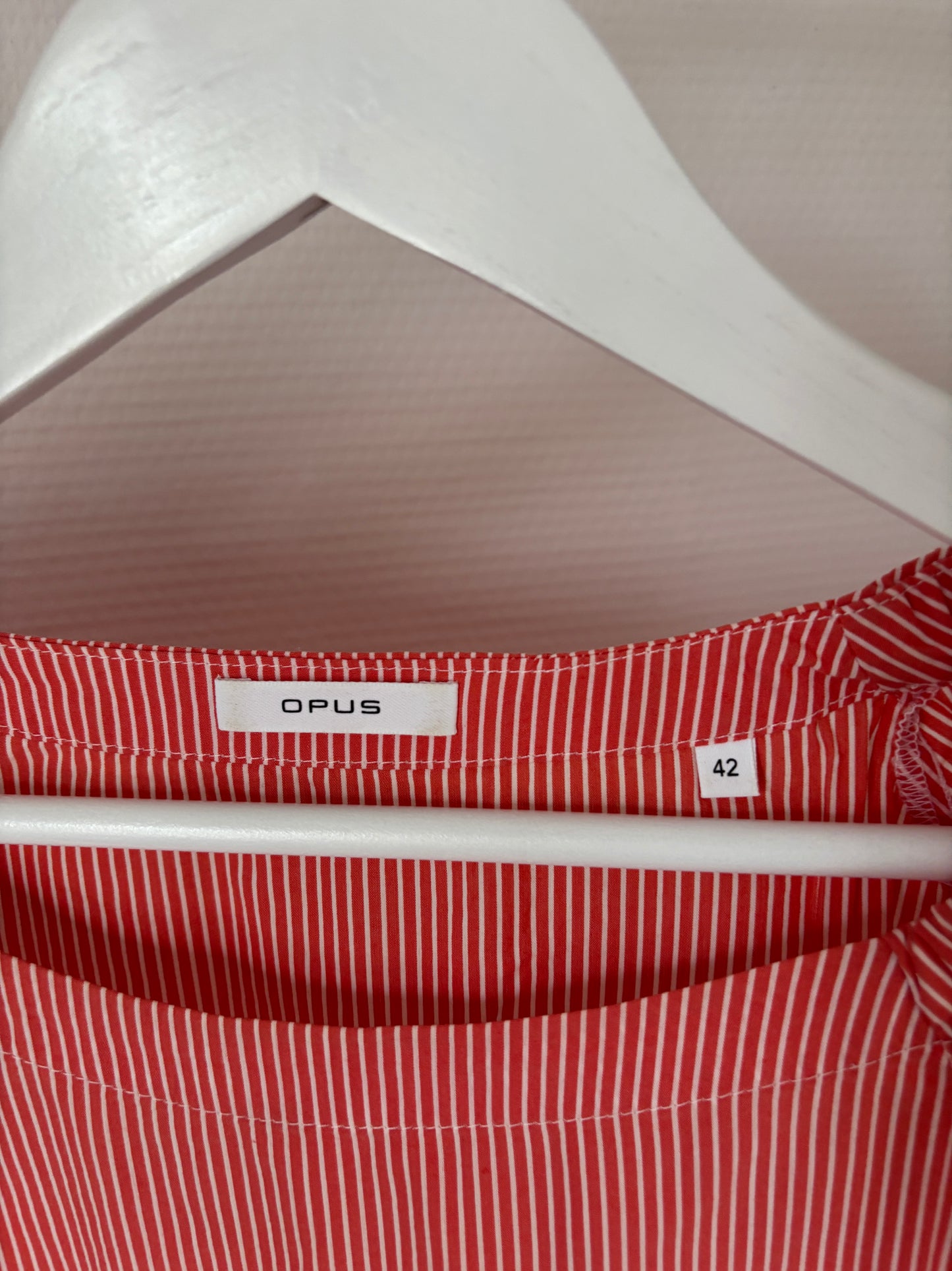 Oranjeroze gestreepte blouse