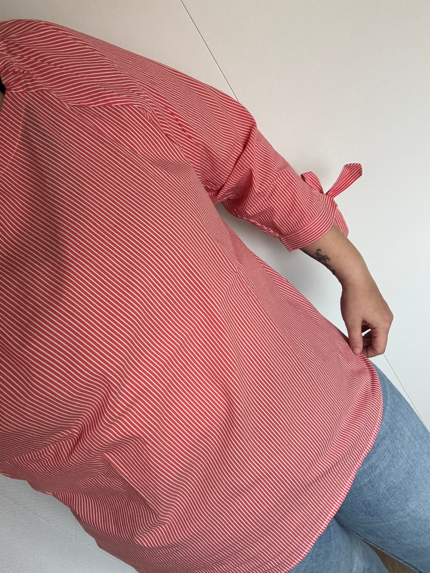 Oranjeroze gestreepte blouse