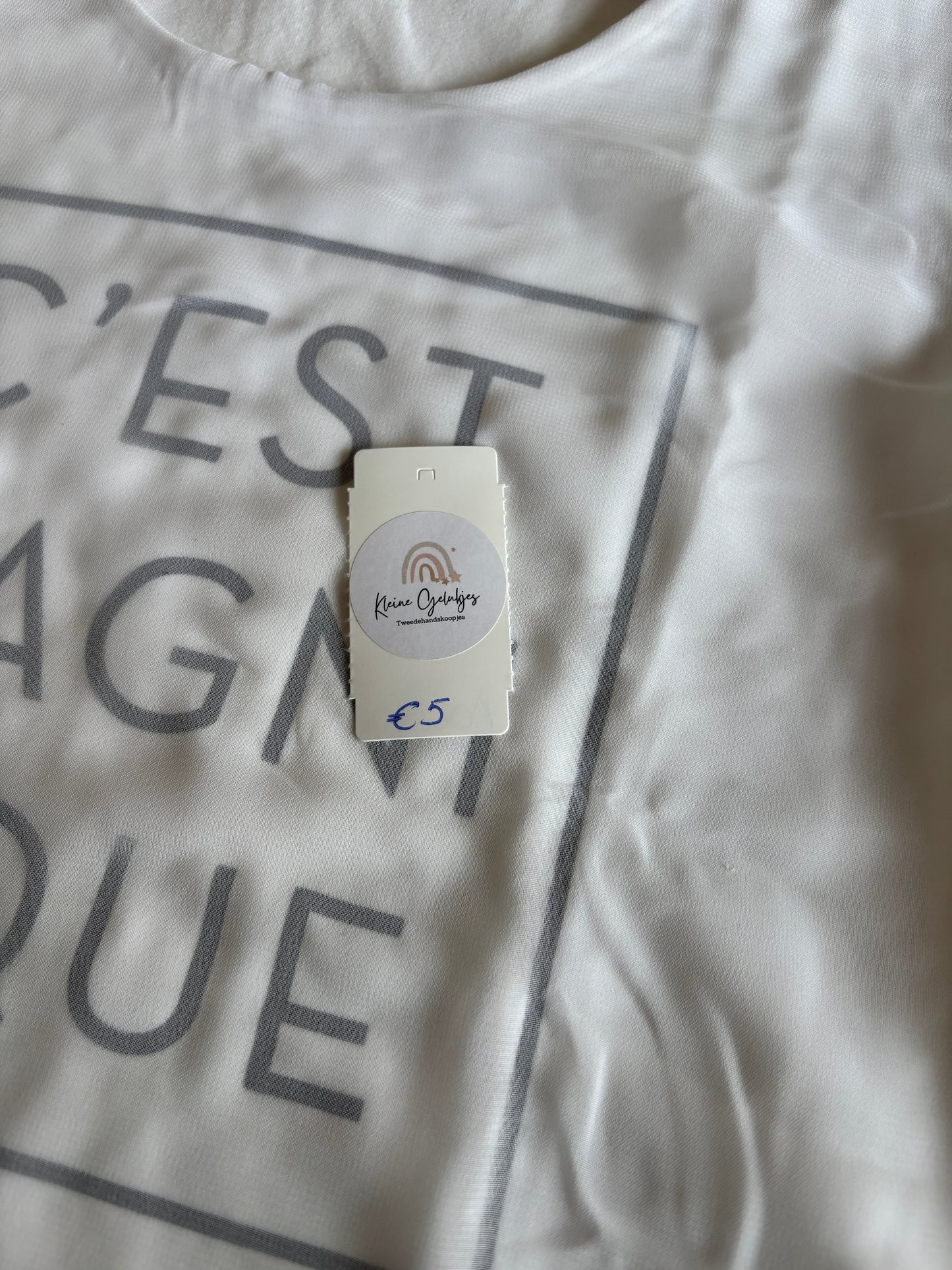 Witte T-shirt "C'est magnifique"
