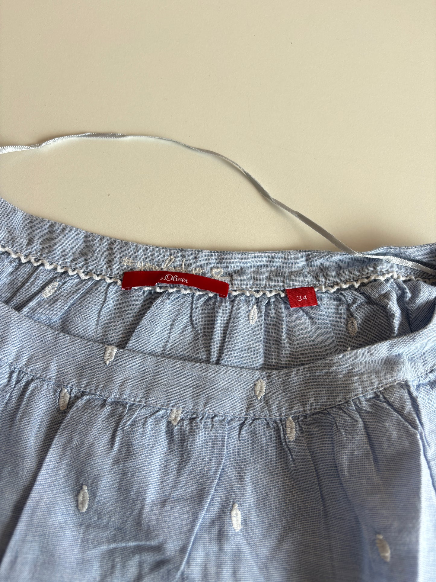 Lichtblauwe blouse met halflange mouwen