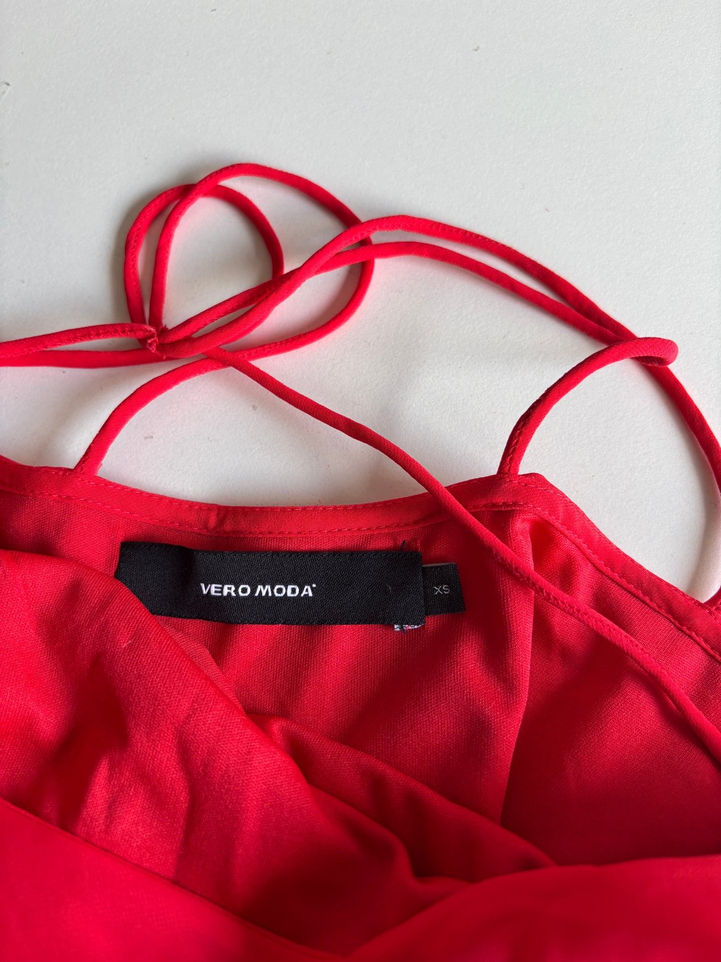 Rode mouwloze lange jurk