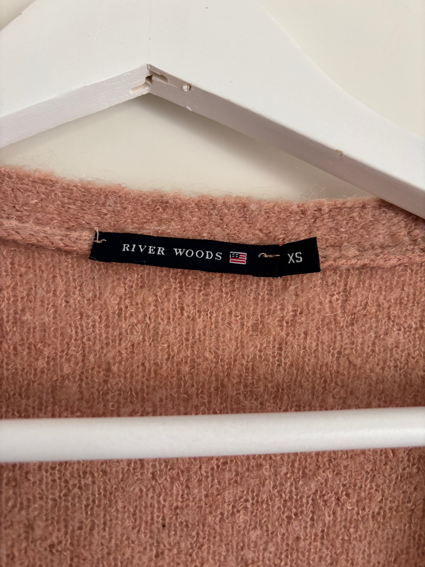 Roze vest met knoopje