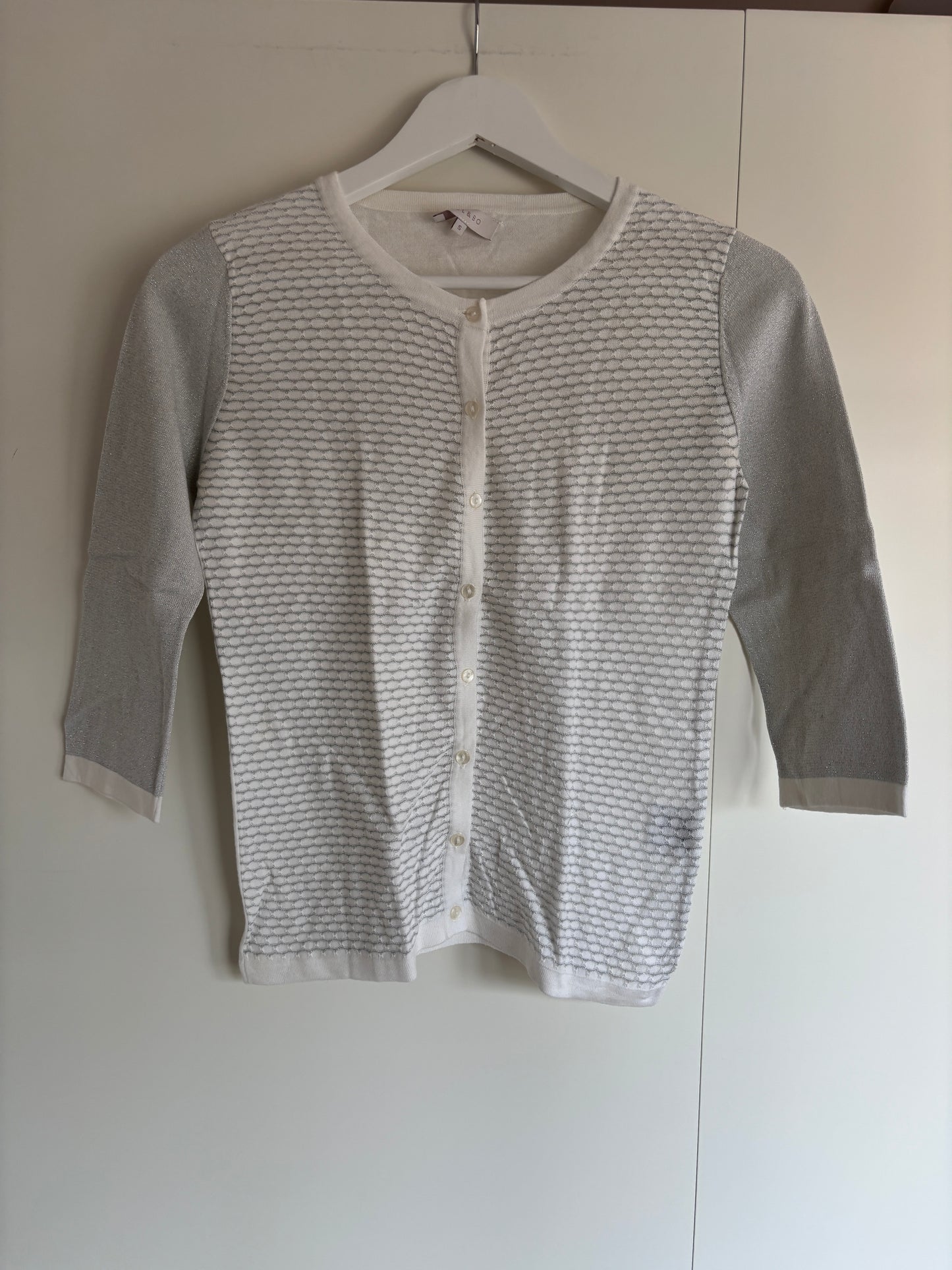 Witte cardigan met halflange mouwen