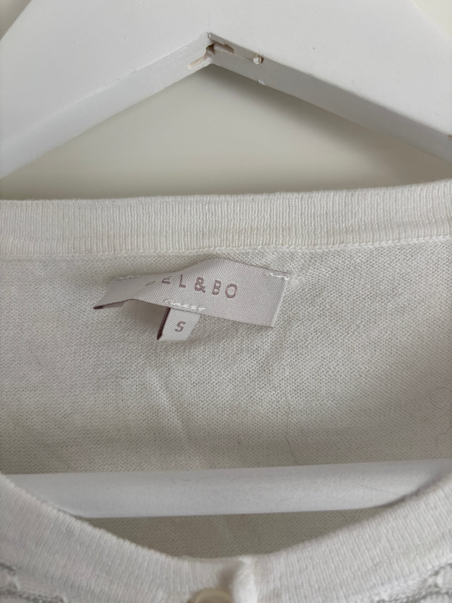 Witte cardigan met halflange mouwen