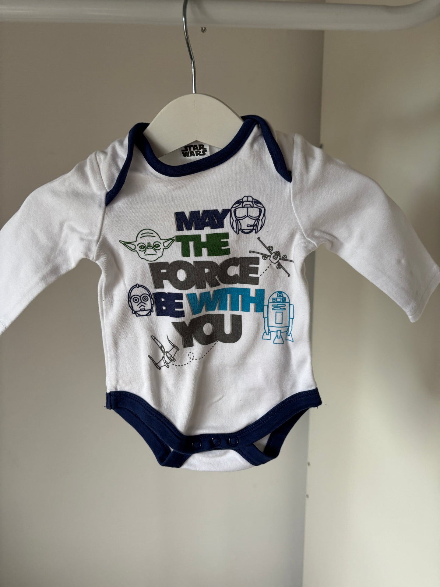 Witte romper met lange mouwen