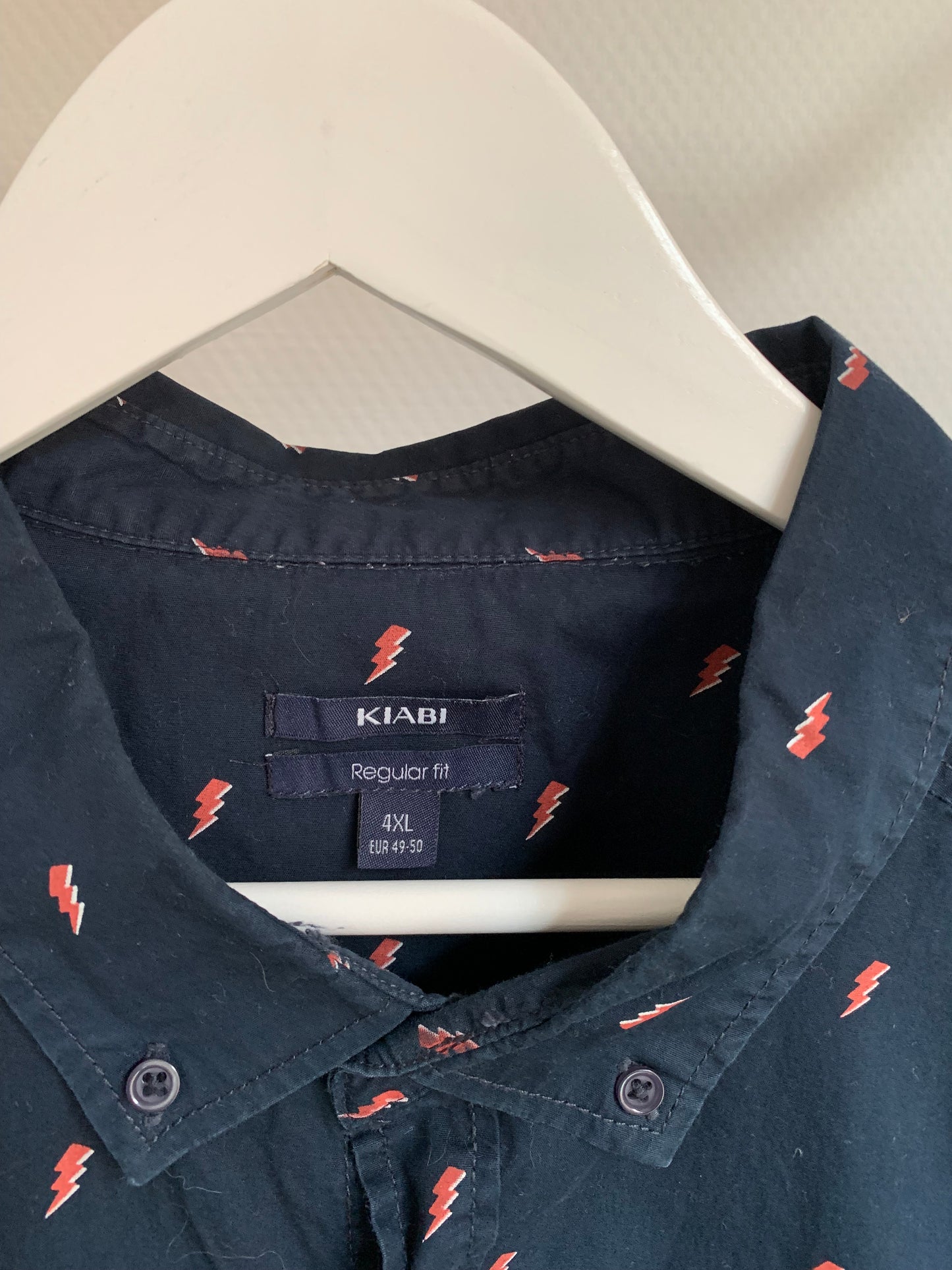 Marineblauw hemd met korte mouwen