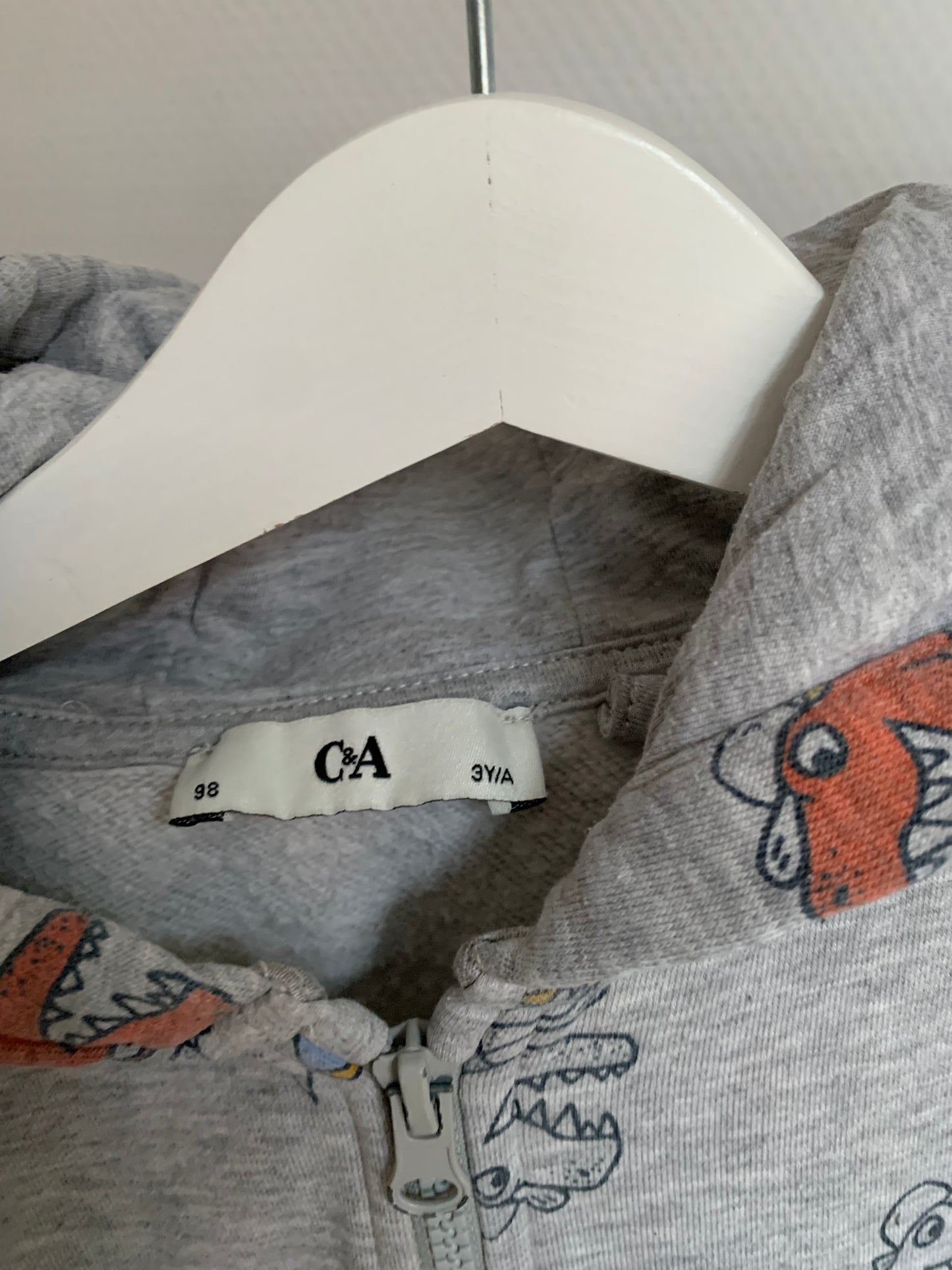 Grijze vest met dino's ⚡