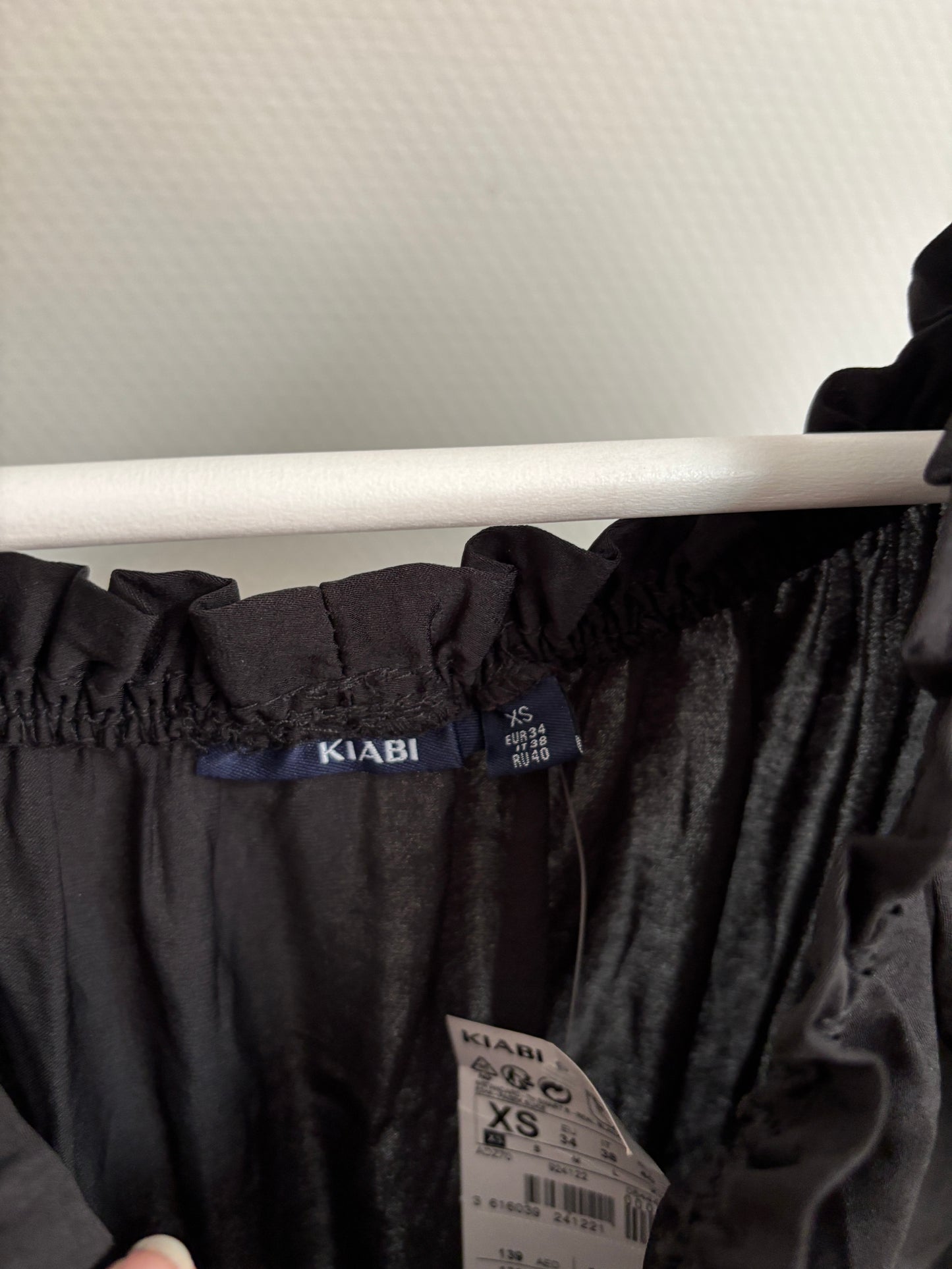 Lange zwarte jurk met riempje