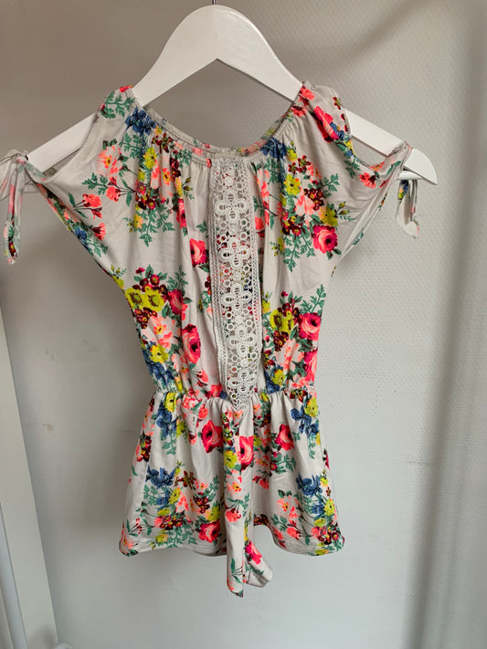 Witte playsuit met bloemetjes