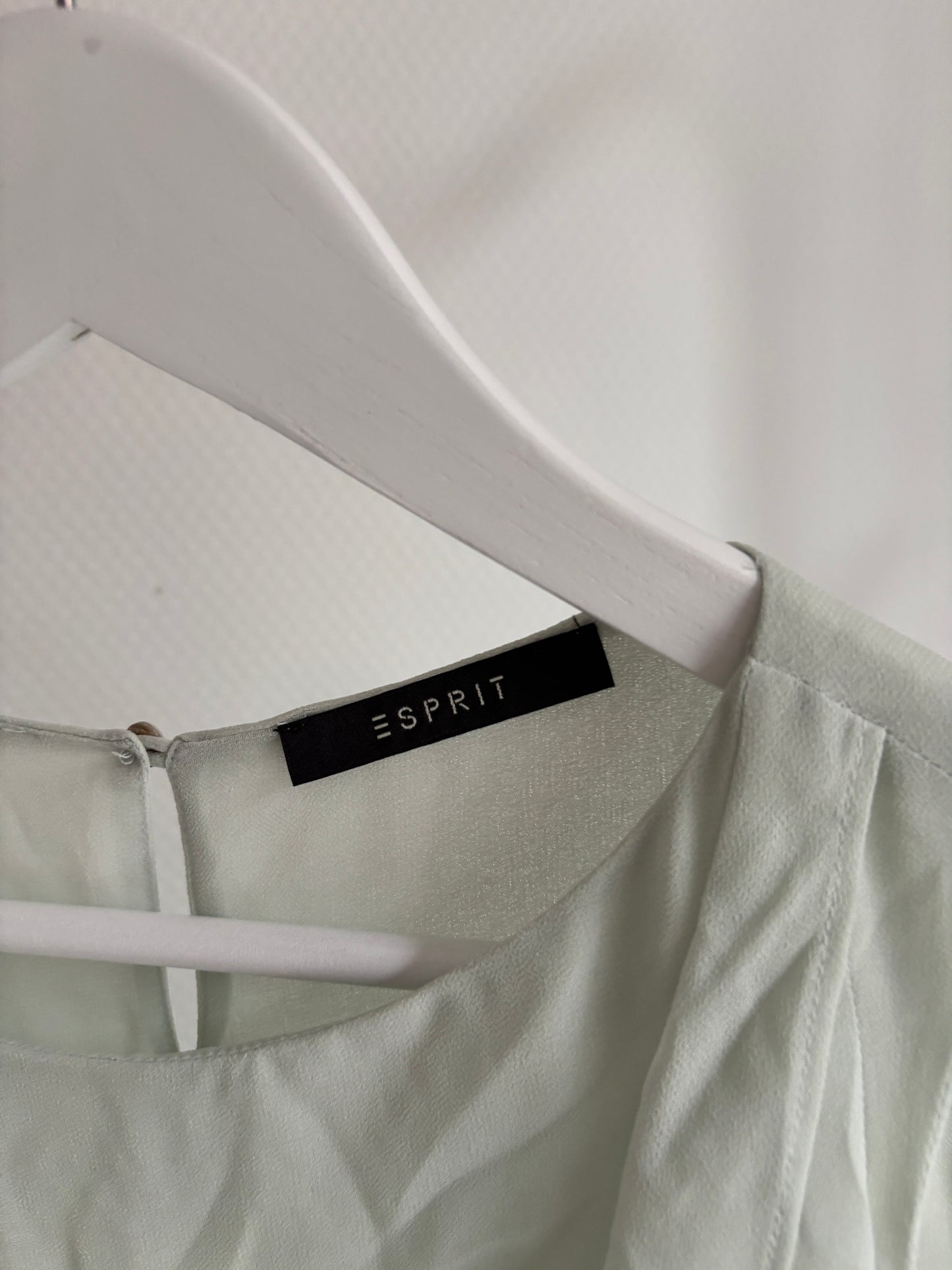 Muntgroene mouwloze blouse