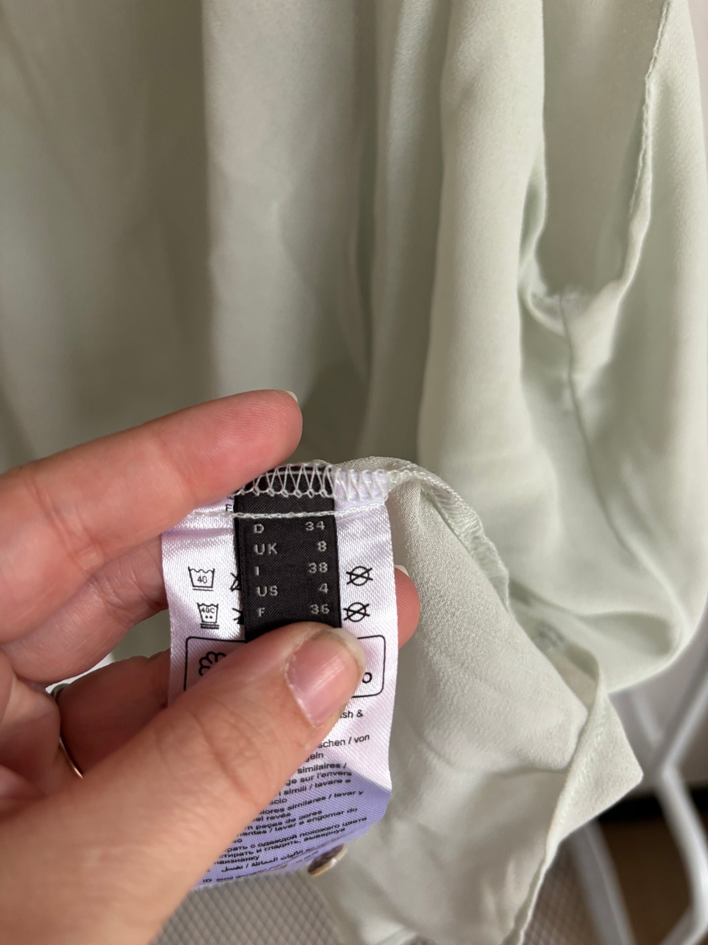 Muntgroene mouwloze blouse