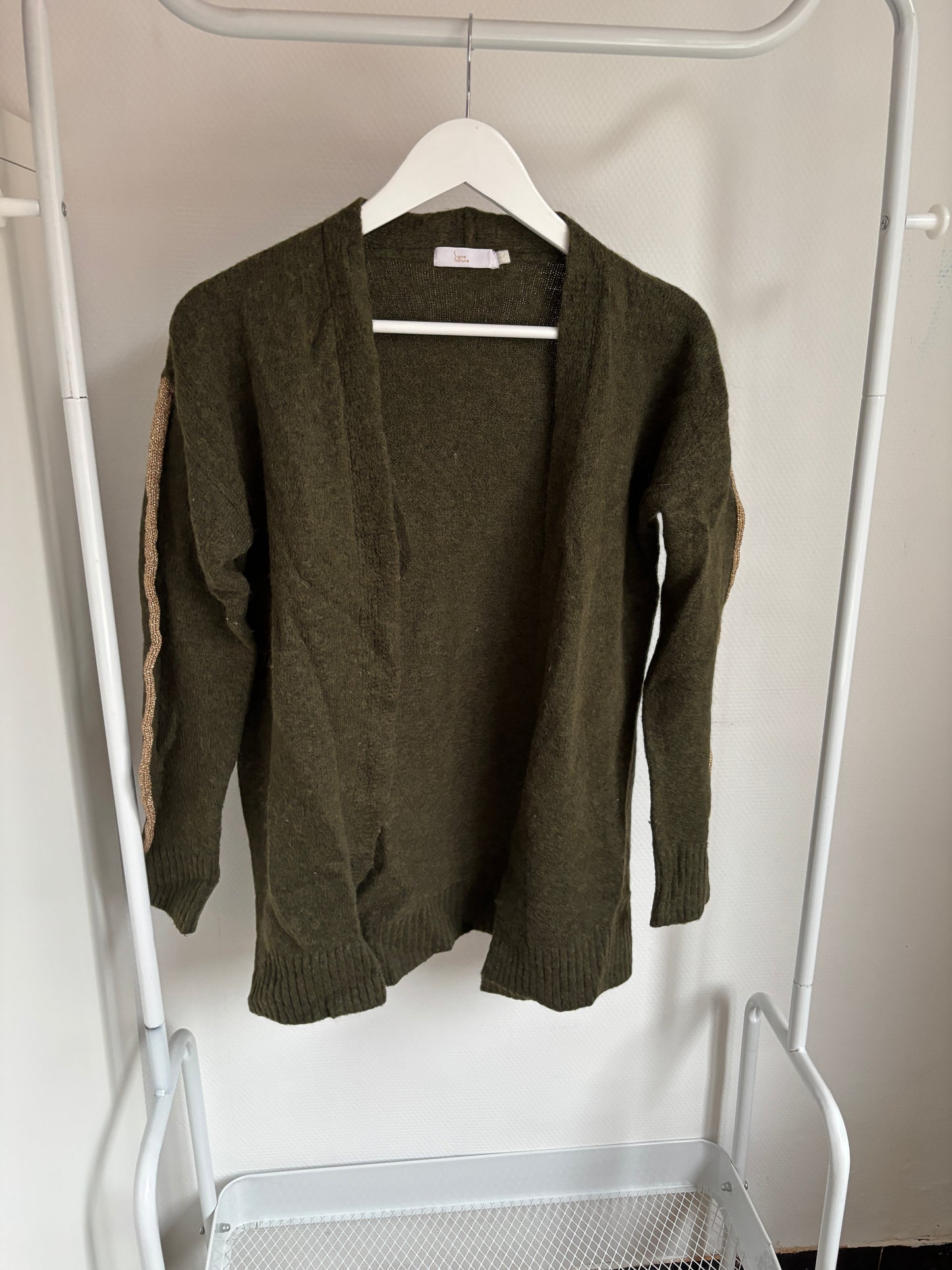 Donkergroene vest met gouden boord