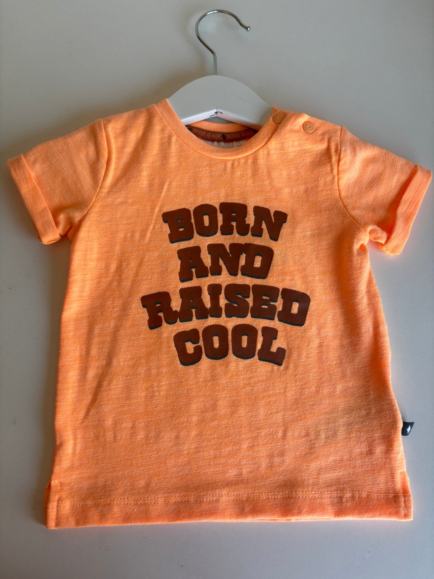 Oranje T-shirt "Born and raised cool"