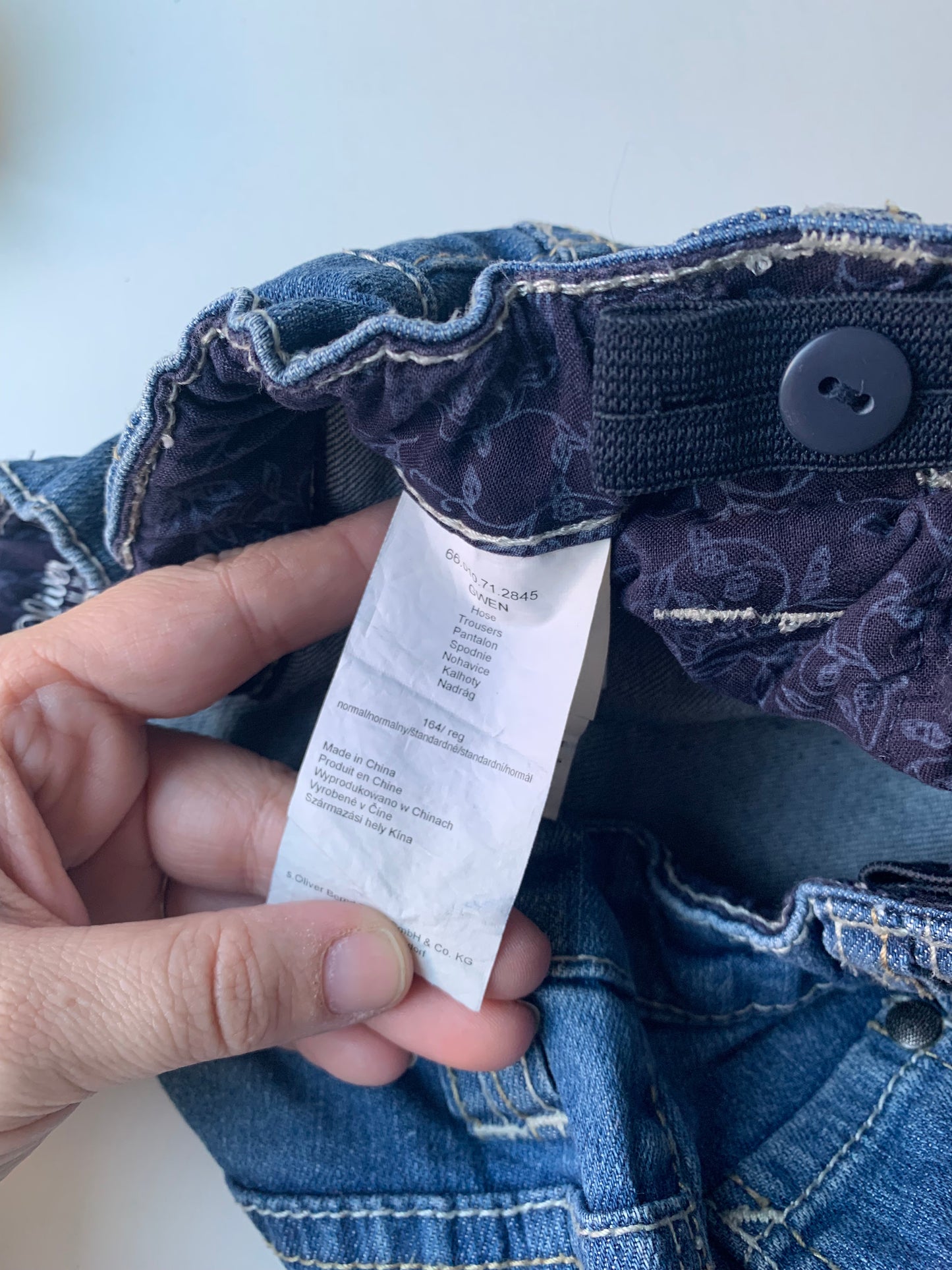 Set: blauwe T-shirt en jeansbroek