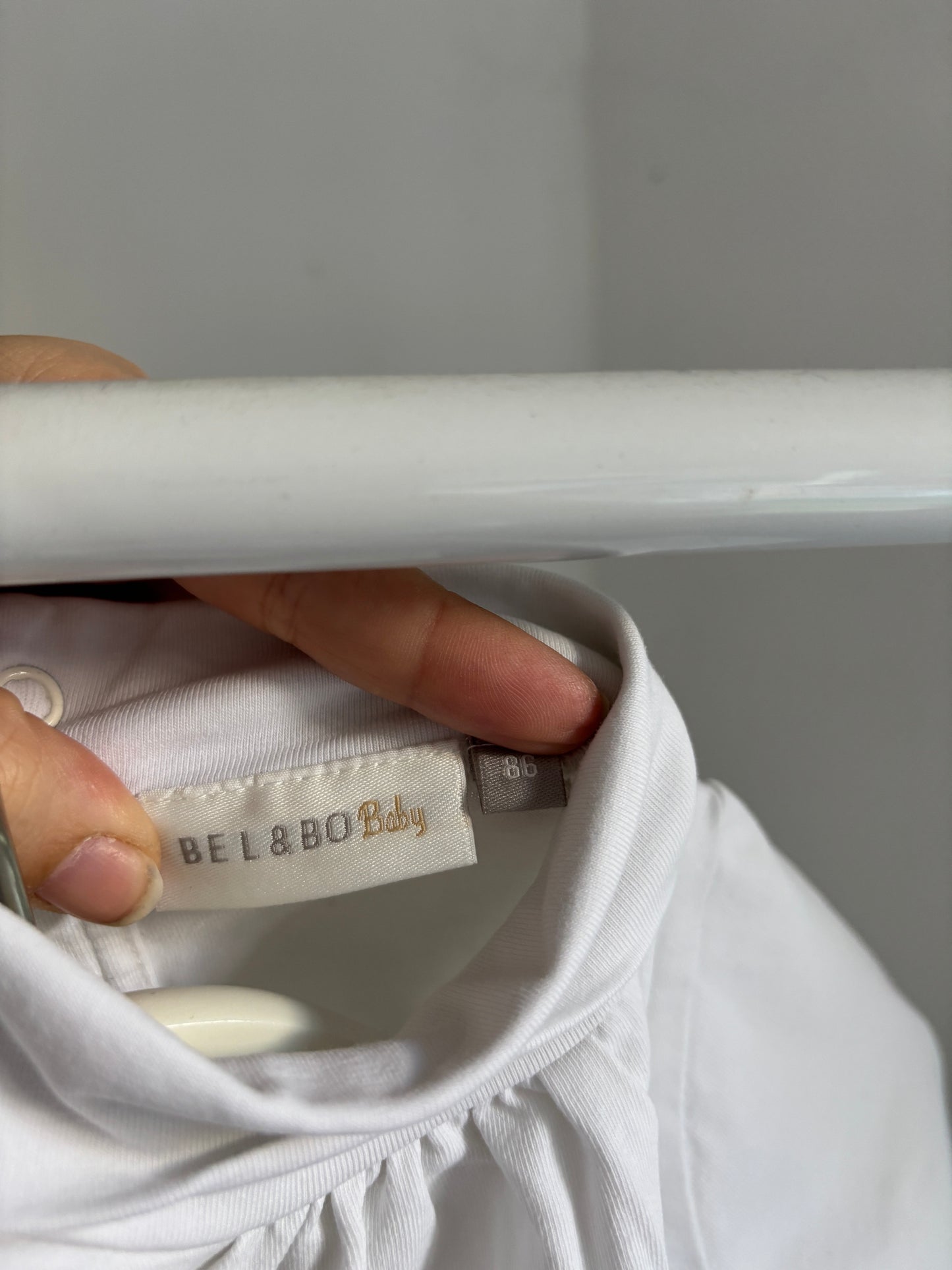 Witte longsleeve met rolkraag