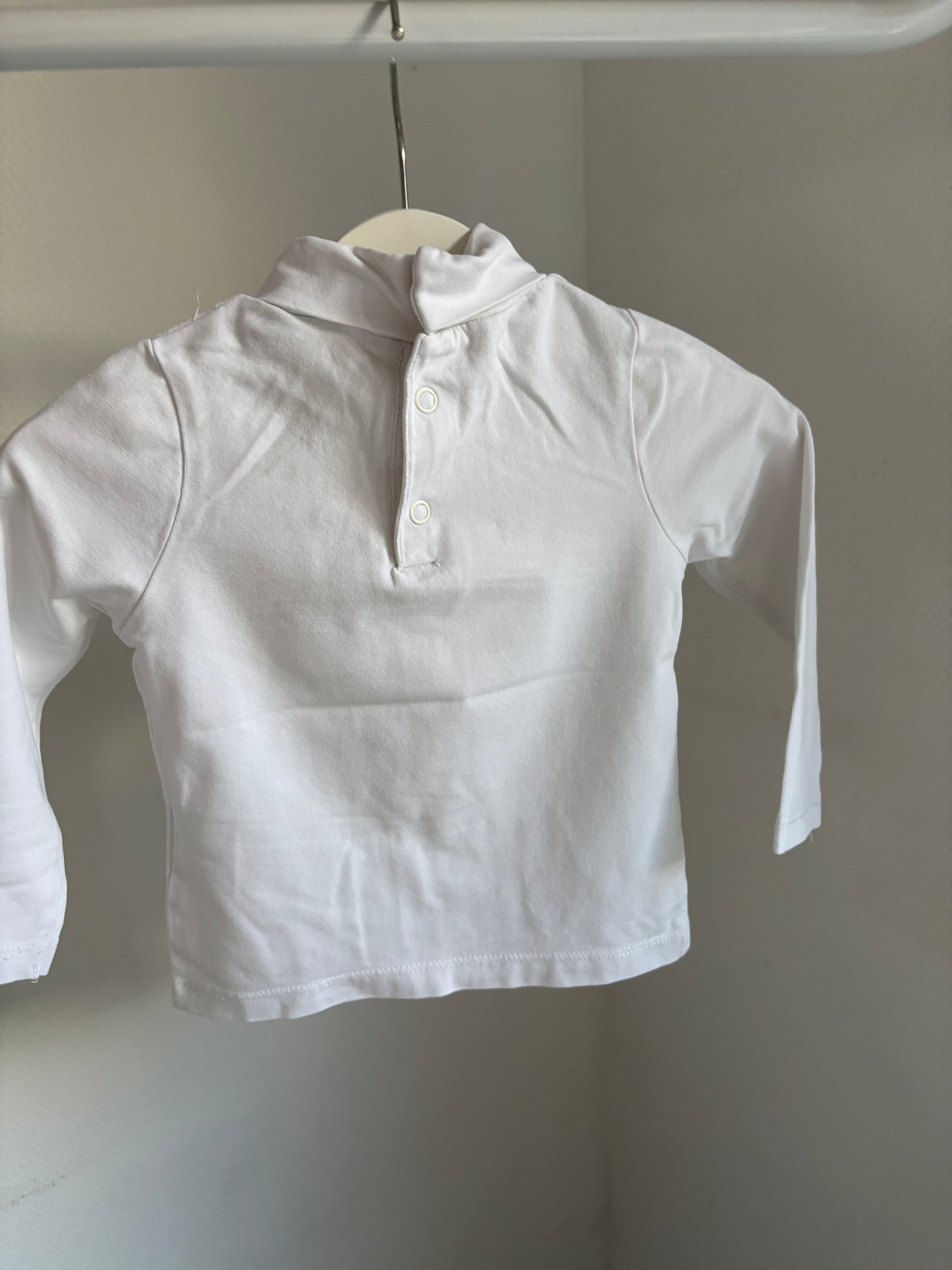 Witte longsleeve met rolkraag