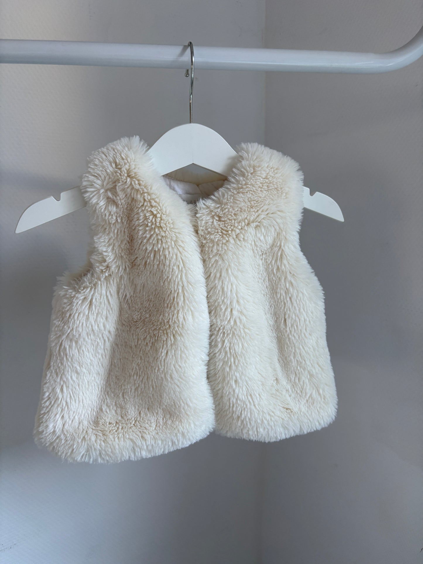 Crèmekleurige bodywarmer