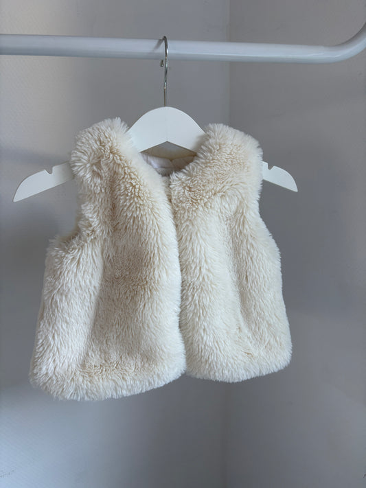 Crèmekleurige bodywarmer